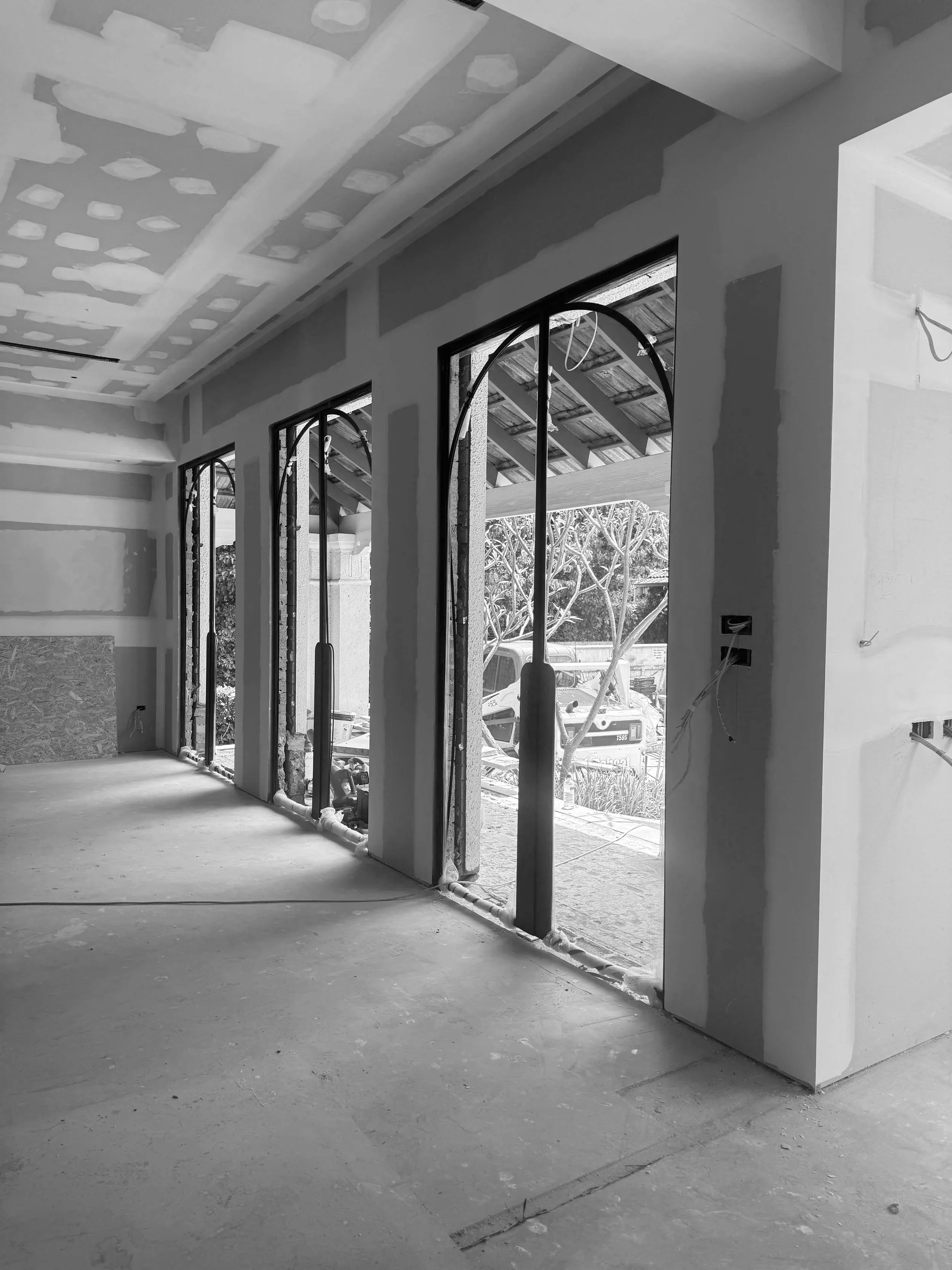 CUSTOM DESIGNED STEEL DOORS WITH CURVED LOCK BOX 