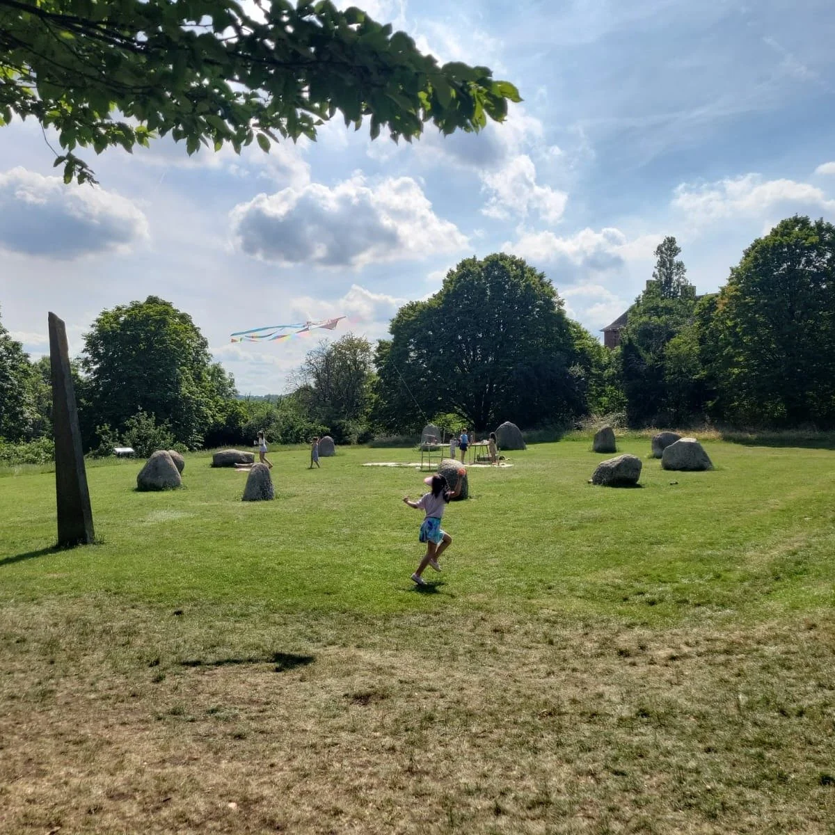 This was one of many fine moments at the end of the solstice weekend, relaxing with some recent and decents around the Stone Circle, as the passersby tinker with the Curiosity Workshops table.

It's amazing what that Stone Circle does for the atmosph