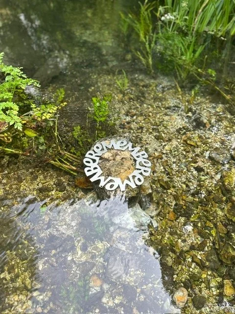 'Remember', 2025, Stainless steel, in the river at Houghton Lodge Gardens
