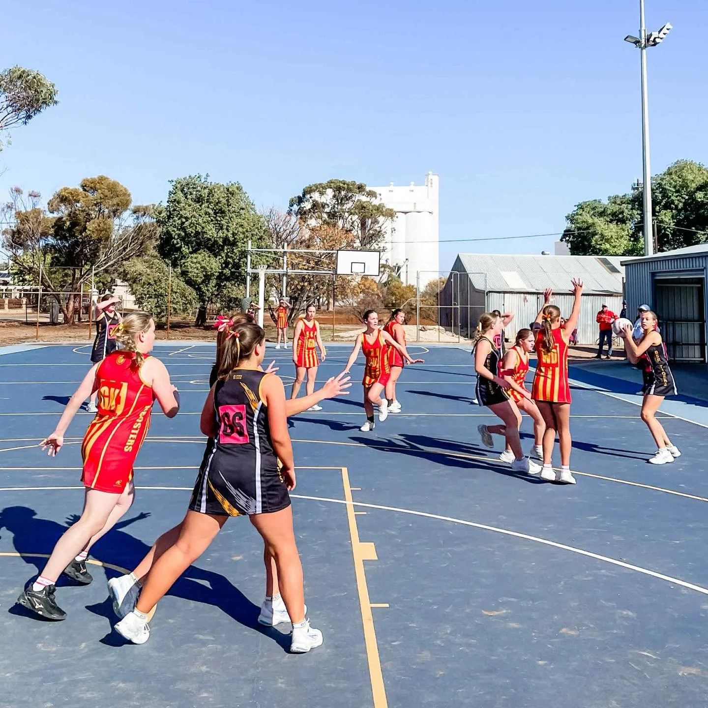Young netballers playing netball on a saturday morning
