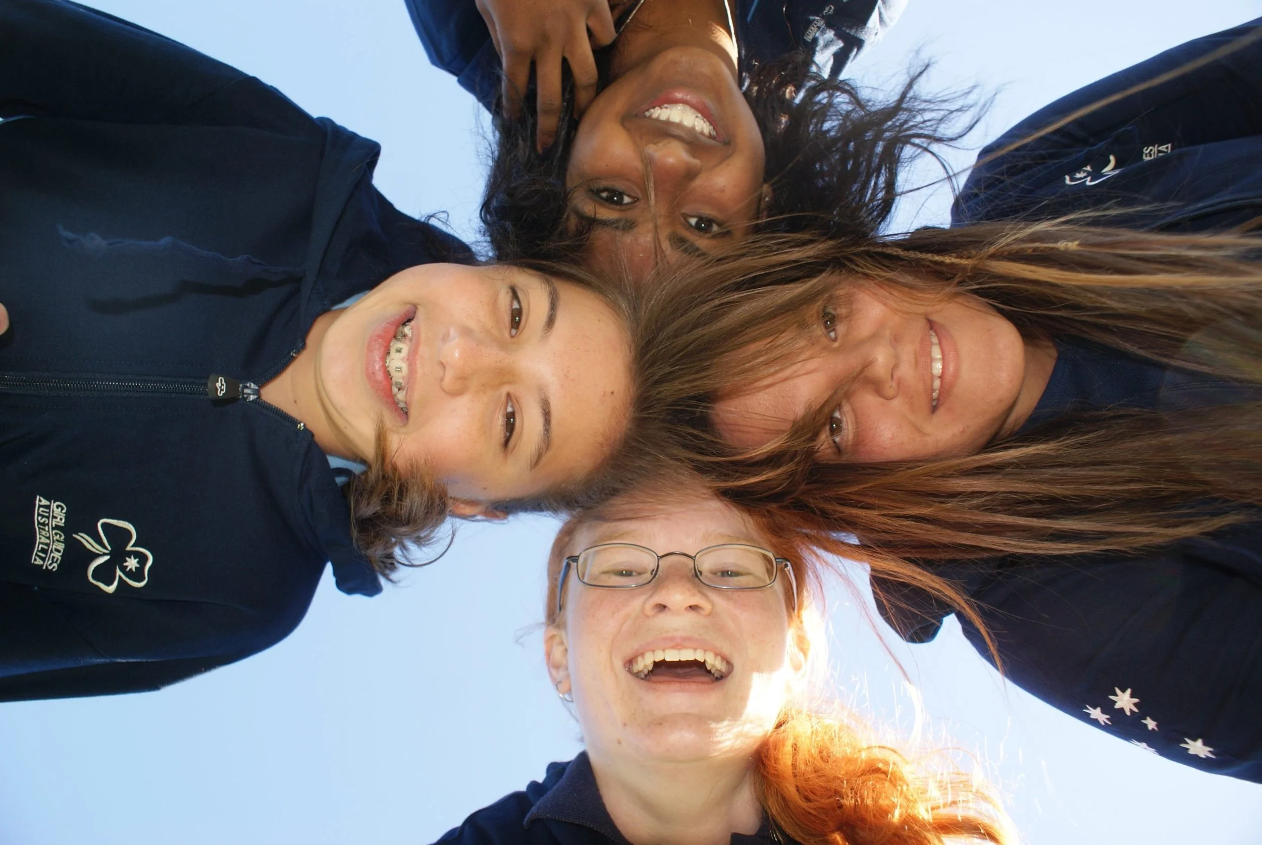 group of young girl scouts smiling