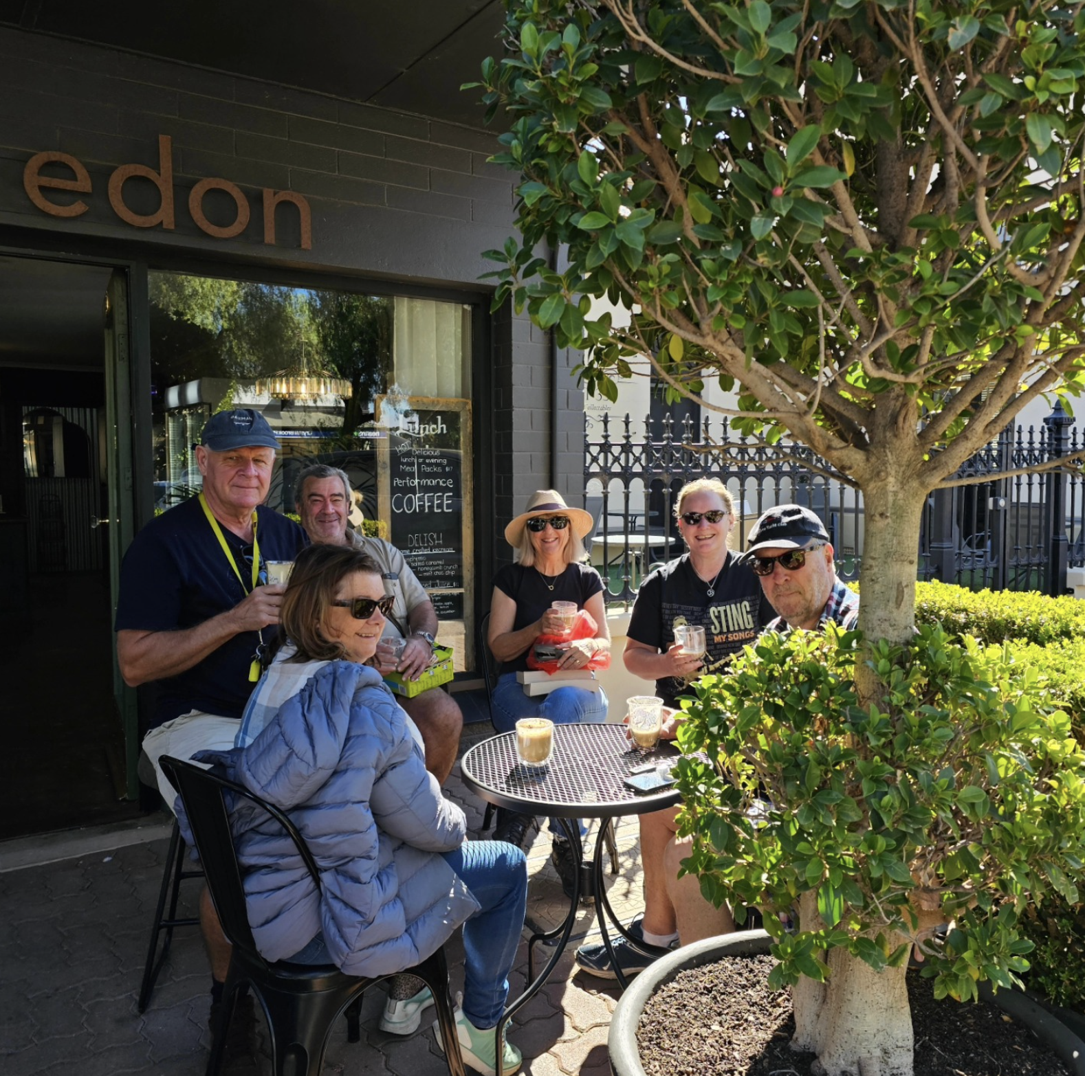 A group of people enjoying a coffee