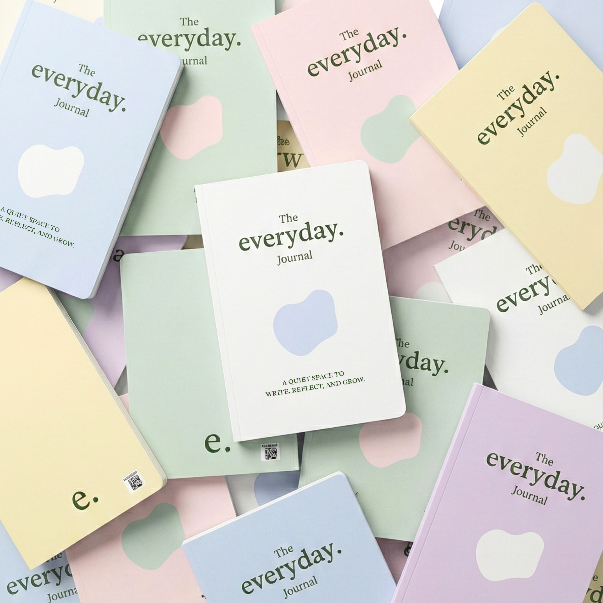 Pastel collection journals by everyday., displayed in a layered flat lay with soft colors, abstract shapes, and clean typography, designed for calm planning, reflection, and daily organization.