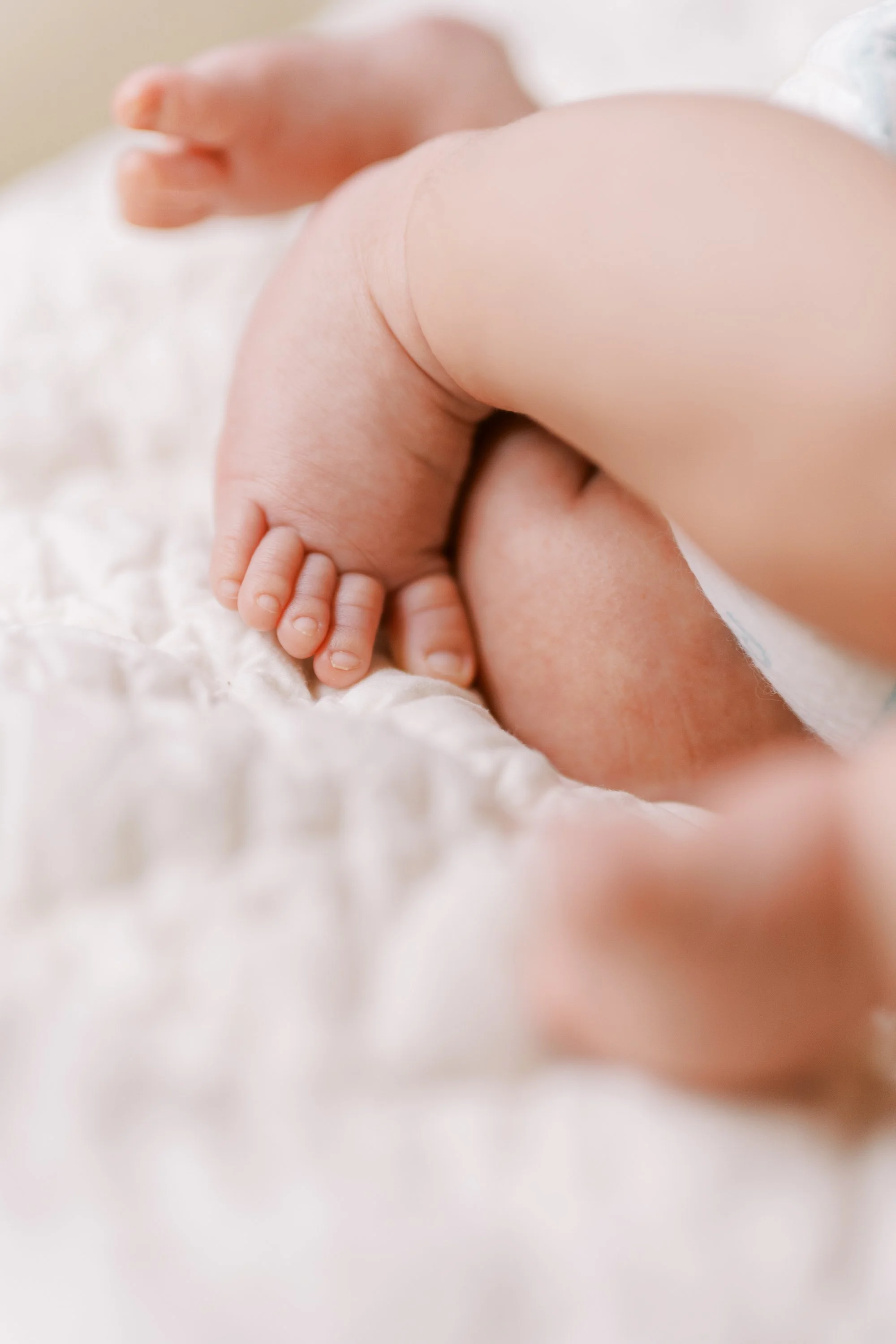 Extreme close-up of newborn baby's sleeping face and delicate features, Roswell, Georgia