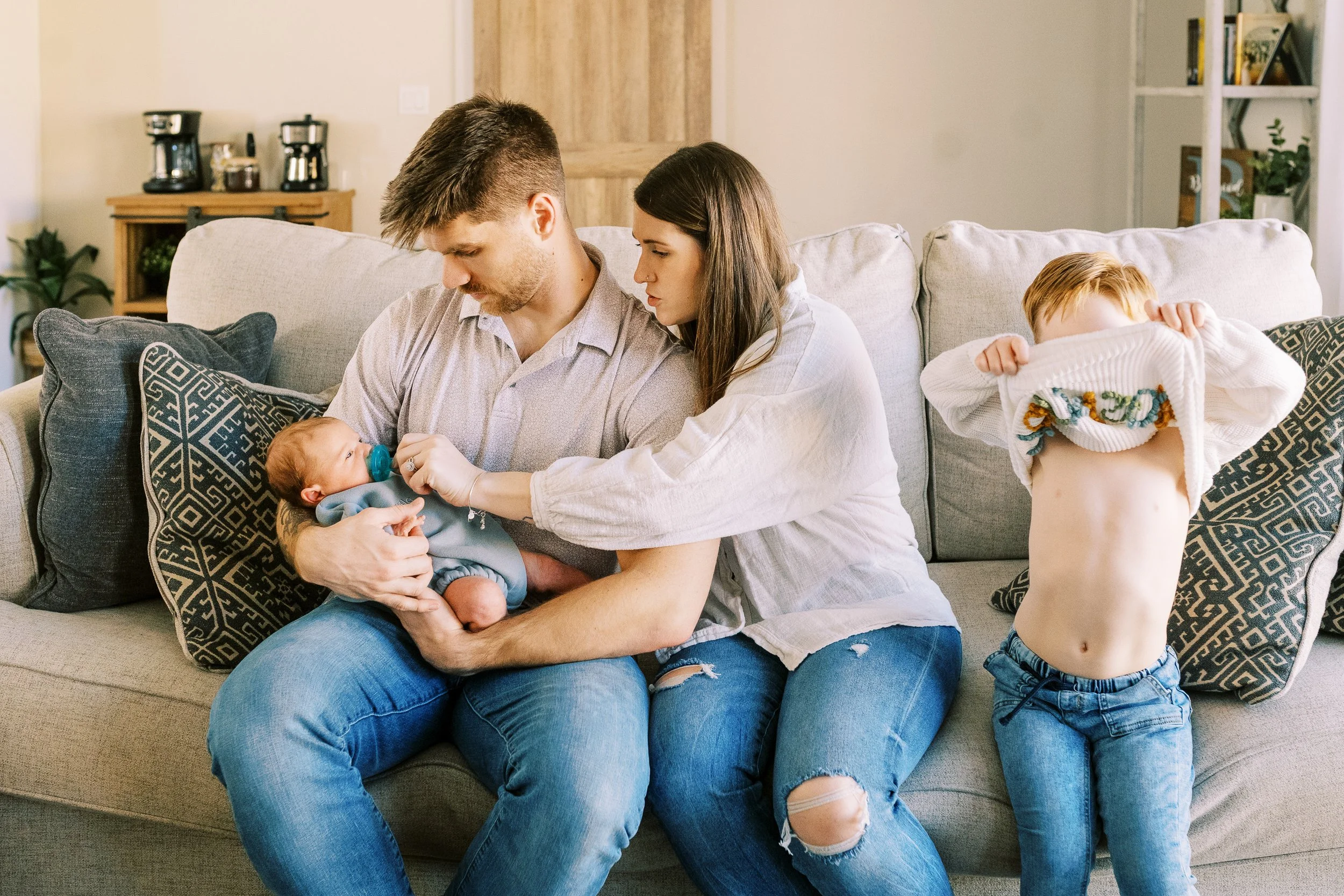 Dad nuzzling forehead to forehead with his newborn baby, Roswell, Georgia