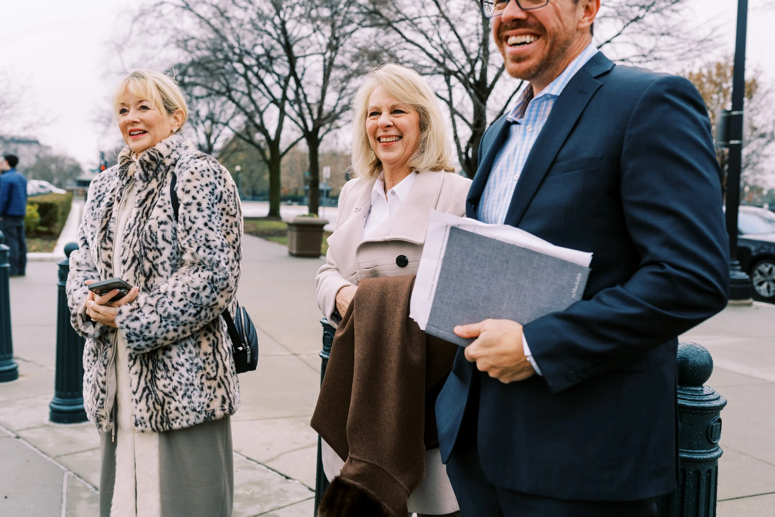 Family and guests arriving outdoors for the elopement celebration