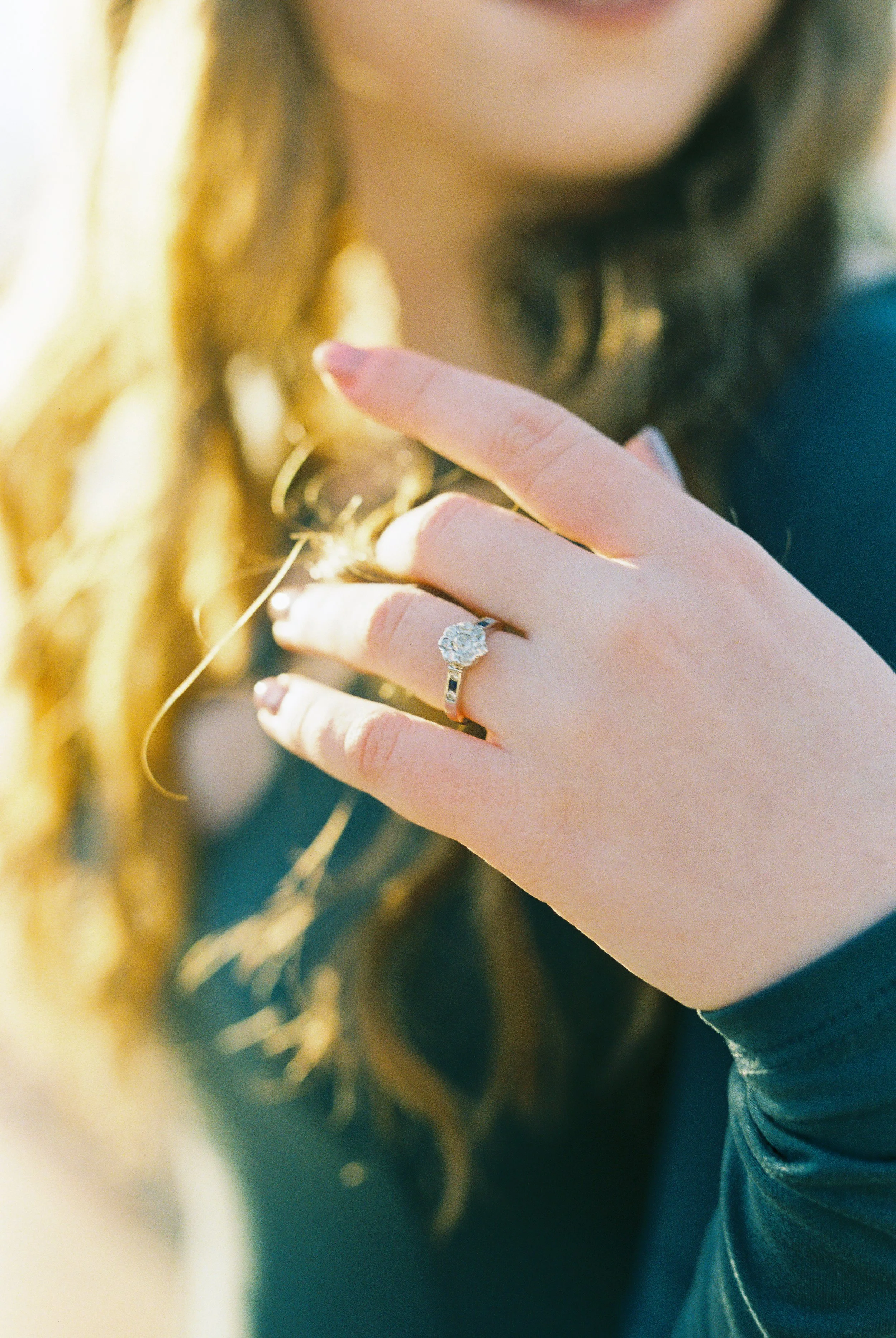 Close-up detail of Maddie's engagement ring during her Dallas, Georgia engagement session.