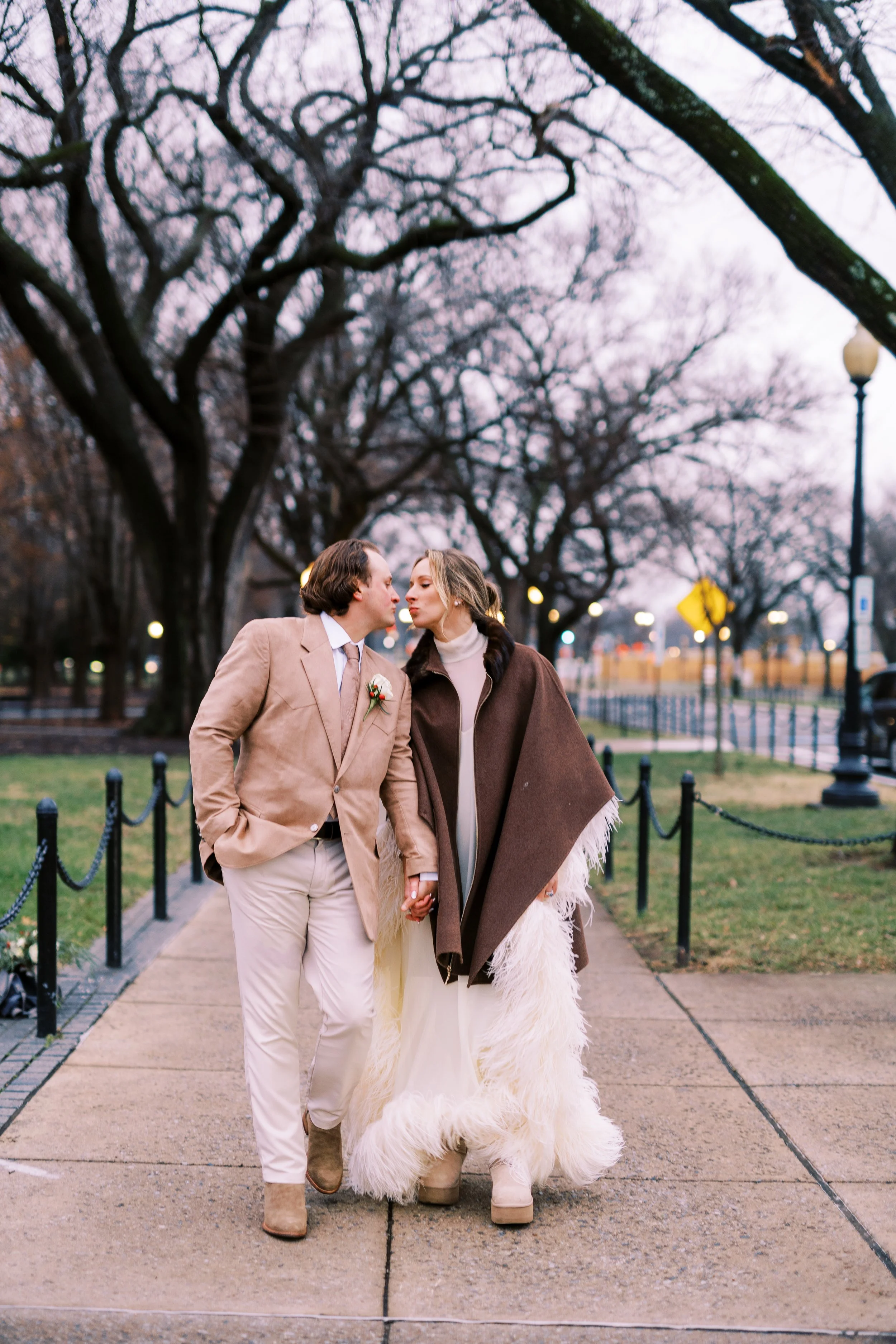 brittany-gail-elopement-washington-dc-couple-walking-cherry-blossoms-monument-1.jpg