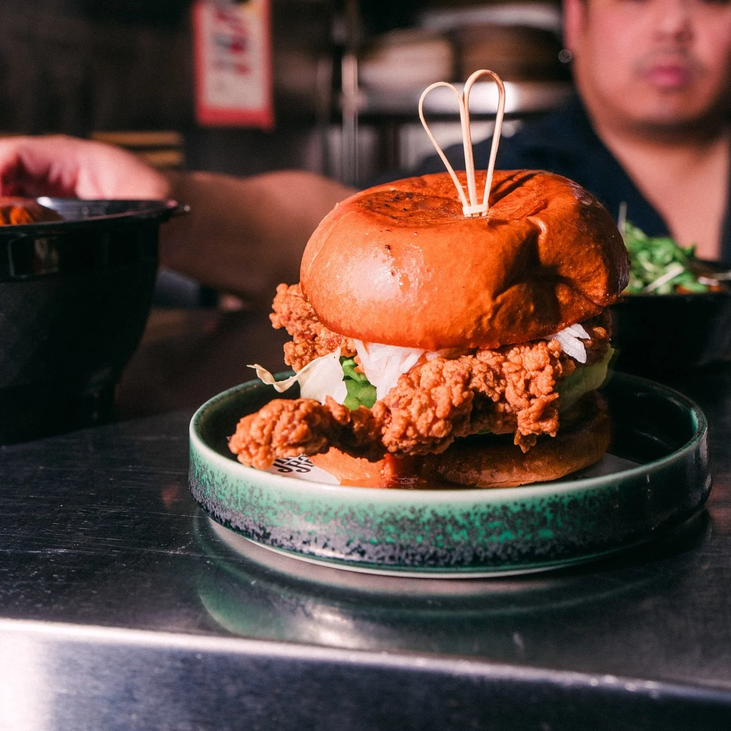 CHICKEN TOM YUM SANDWICH - brioche bun, fried chicken, spicy tom yum sauce, pickled daikon

📸: @cmcintoshphoto 

#meraibar #elevateddivebar #friedchicken #hotchicken #tomyum
