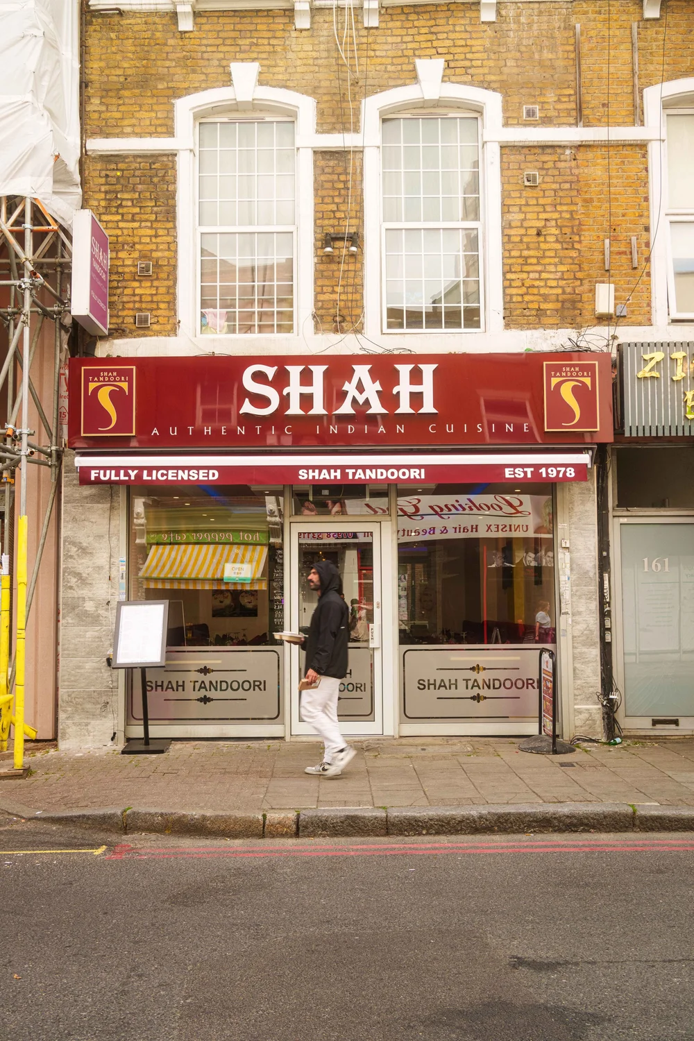 The red storefront of Shah Tandoori on Drummond Street, near Euston Station