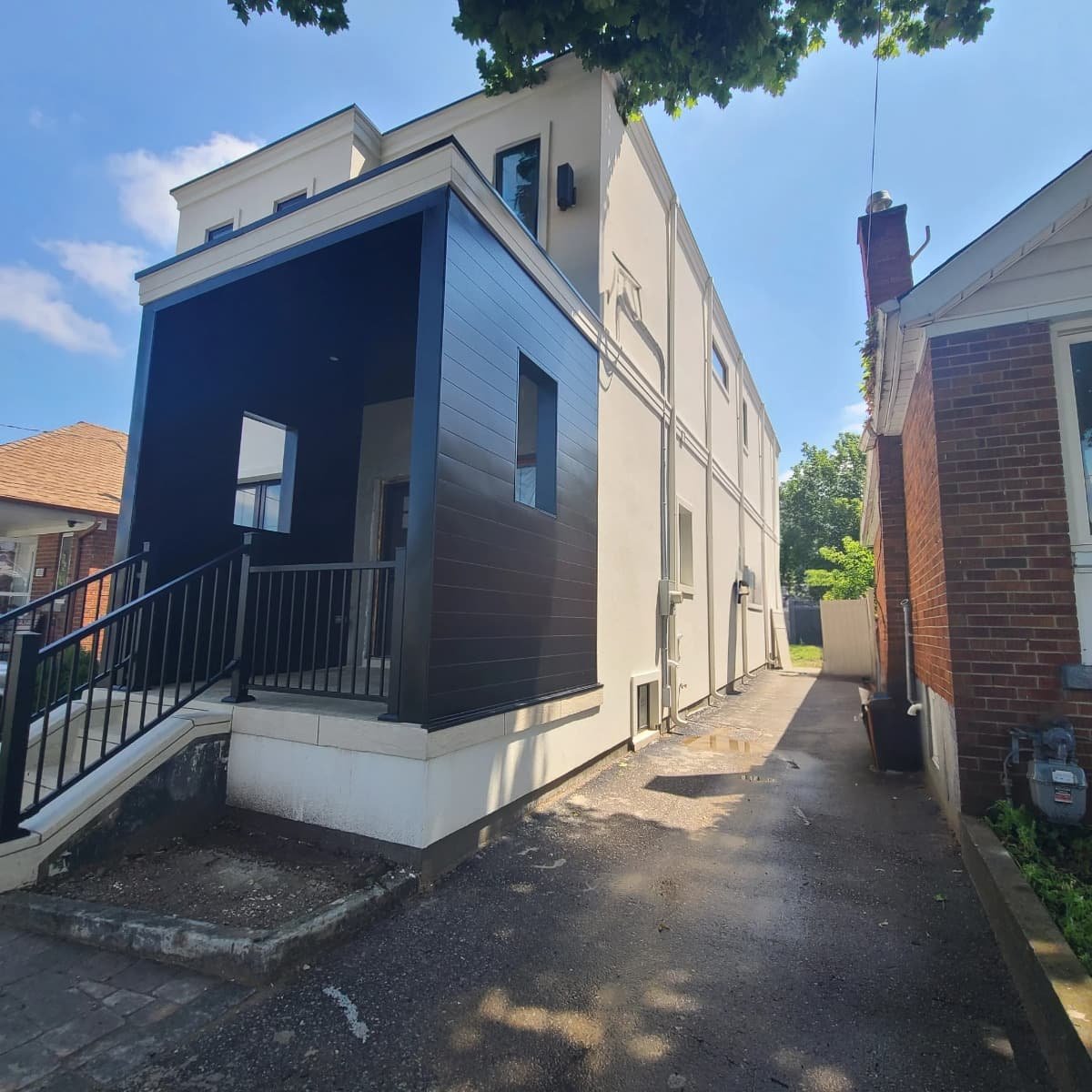 Modern 2 Storey addition with contemporary front portal concept