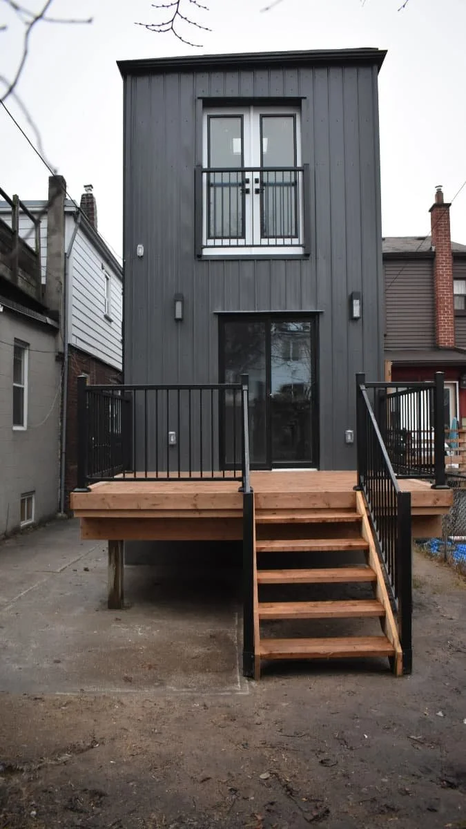 two storey rear addition with new wood deck in Toronto