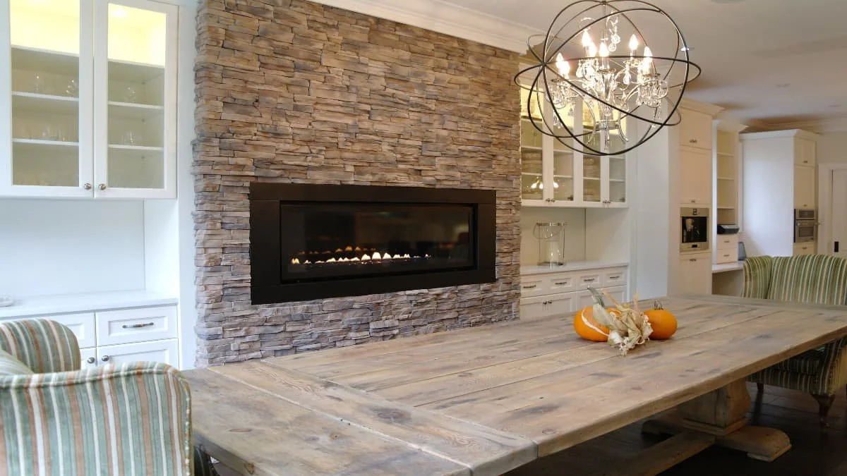 Farmhouse dining room with white cabinetry and built in fireplace.jpg
