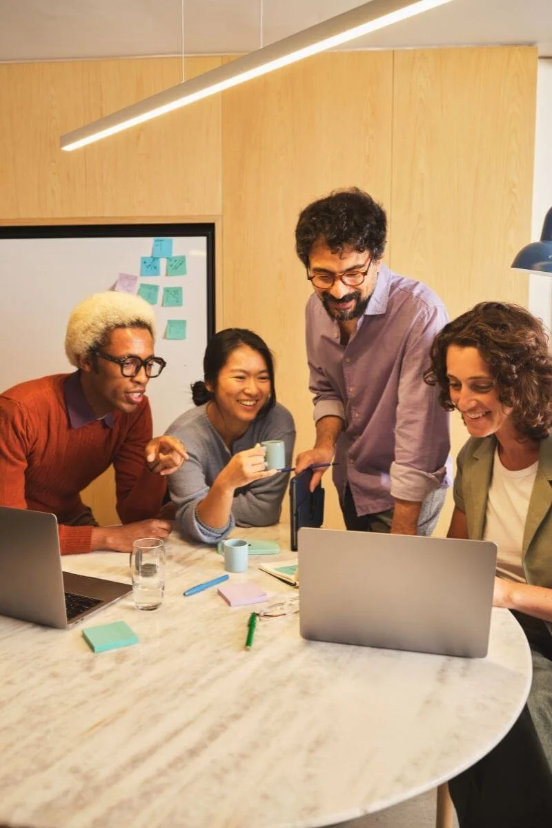 Marketing strategist collaborating with agency team on client strategy