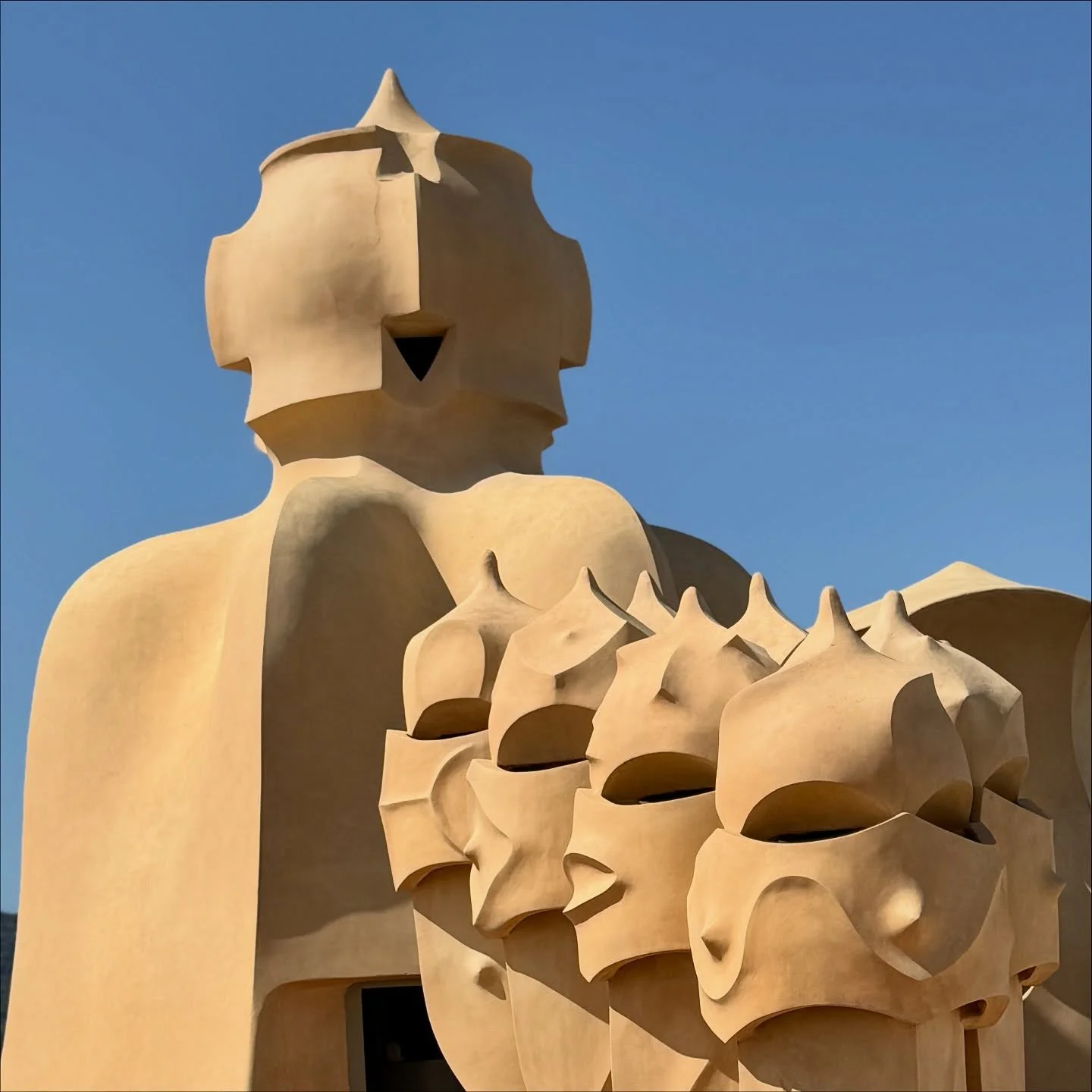 Sculpted dreams meet the sky &mdash; the surreal rooftop of Casa Mil&agrave; in Barcelona, Antoni Gaud&iacute;&rsquo;s masterpiece of organic architecture. These whimsical chimneys blur art and function, standing as timeless sentinels of creativity a