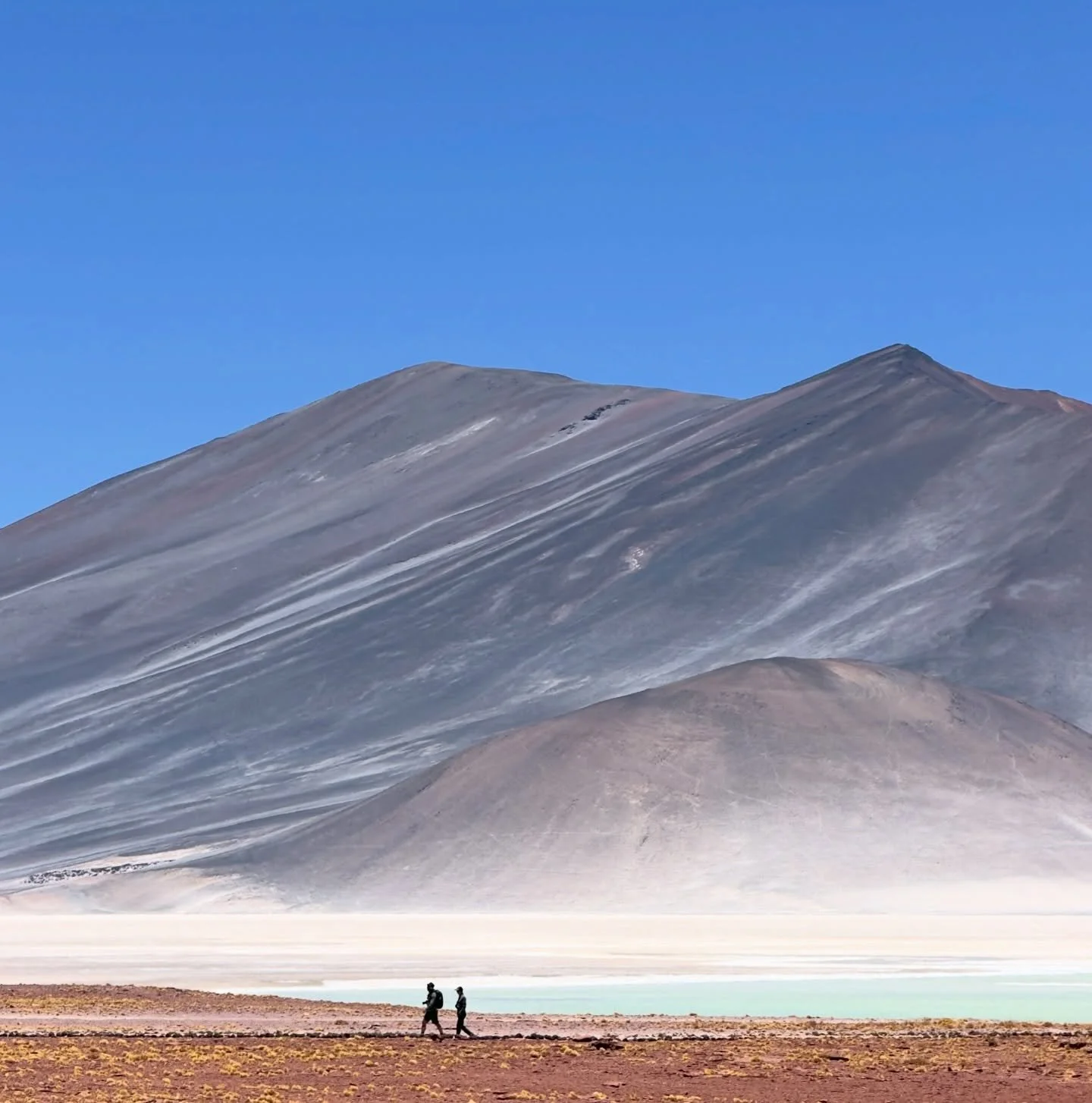 Walking through surreal silence at Piedras Rojas salt pools in the Atacama Desert, where crimson earth meets turquoise water and endless sky. A reminder of scale, solitude, and wonder. #Atacama #PiedrasRojas #Chile #Desert #SaltPools Travel