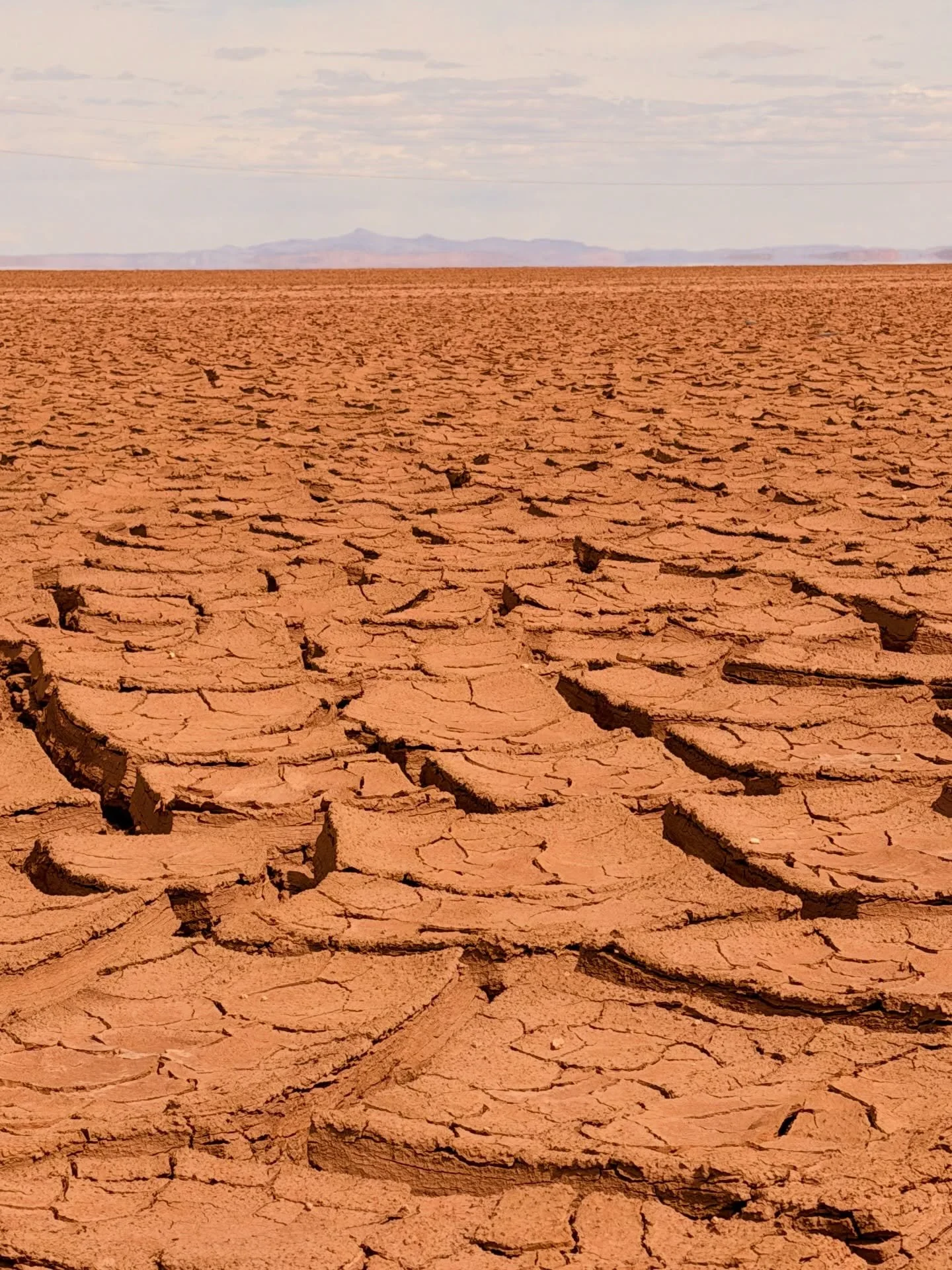 UYUNI 🇧🇴.
Driving through Uyuni, we pulled over to breathe it in: cracked earth stretching forever, silence louder than engines, colors baked by sun. A brief stop, a lasting pause, where the road dissolves into raw, humbling space under endless And
