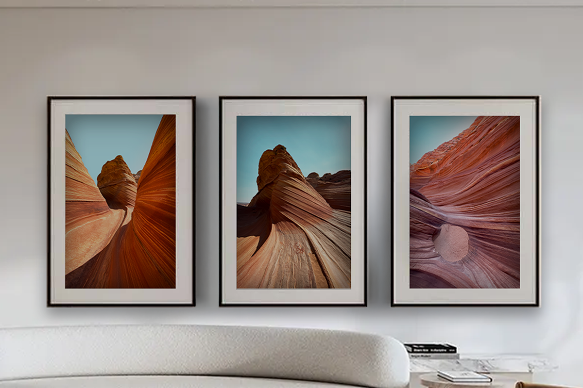 Architectural photograph of sculpted sandstone forms in a natural landscape, framed and displayed in a minimal interior setting by Jay Britto.