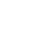 Close-up of a directional arrow symbol on a dark background.