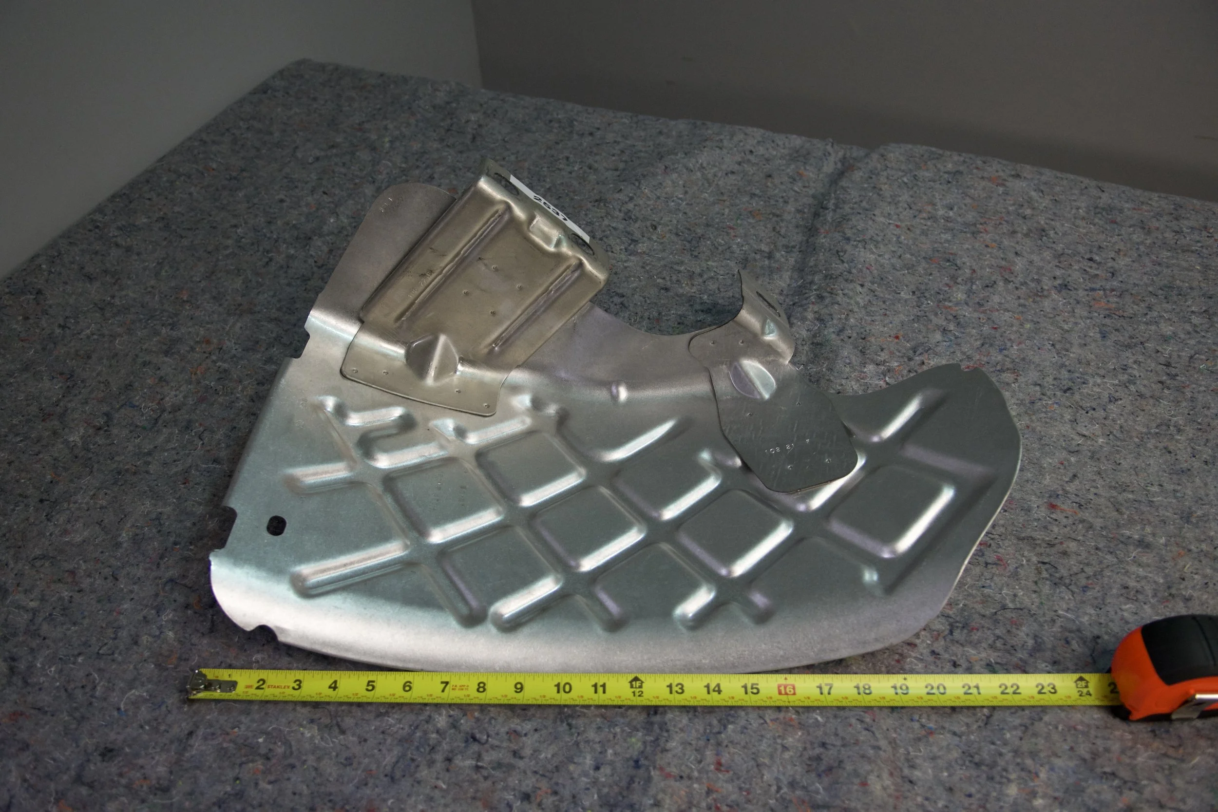 OEM-style spare tire heat shield for 2017–2025 Ford Super Duty F-250 and F-350, protects tire from exhaust heat.