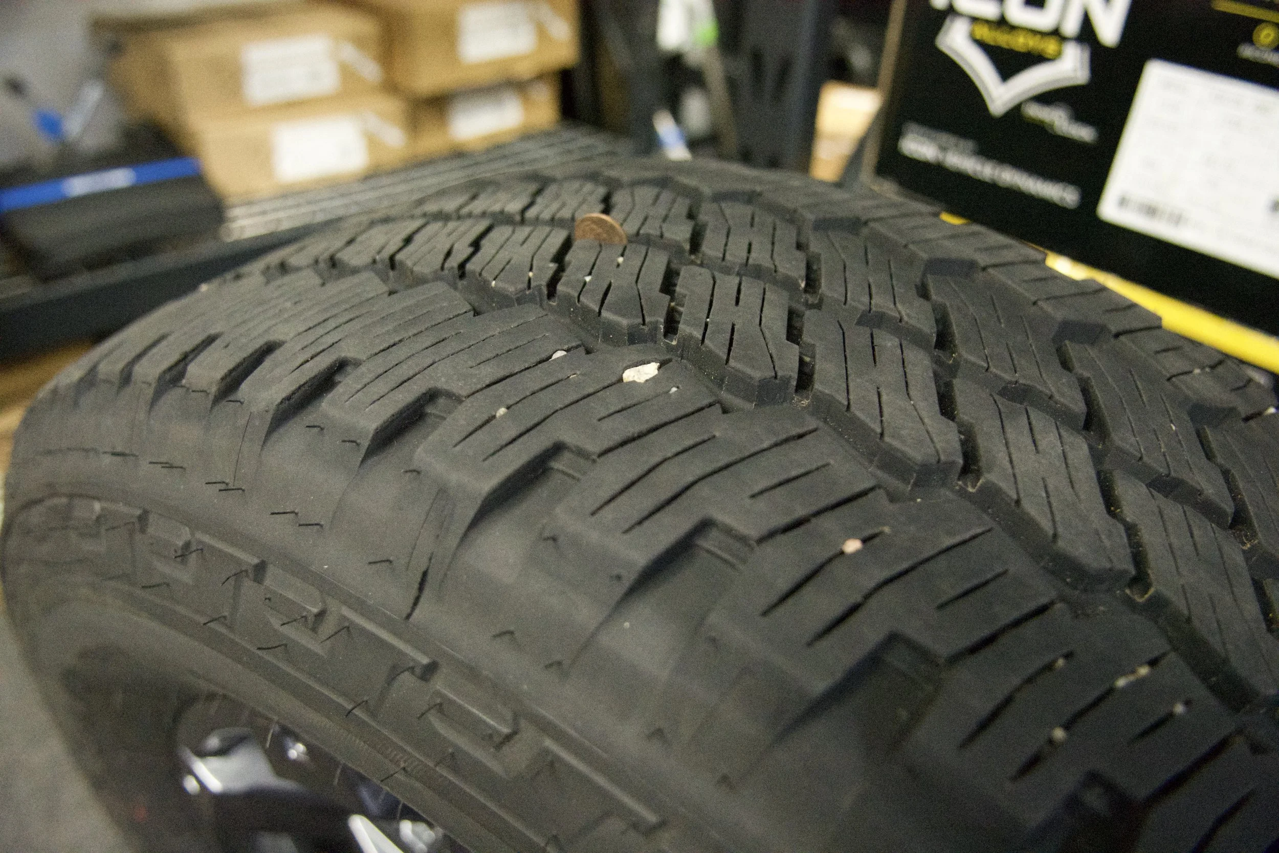 Bridgestone Dueler A/T LT275/65R20 all-terrain truck tire with 126/123R load rating and M+S rating, ideal for off-road and all-season driving.