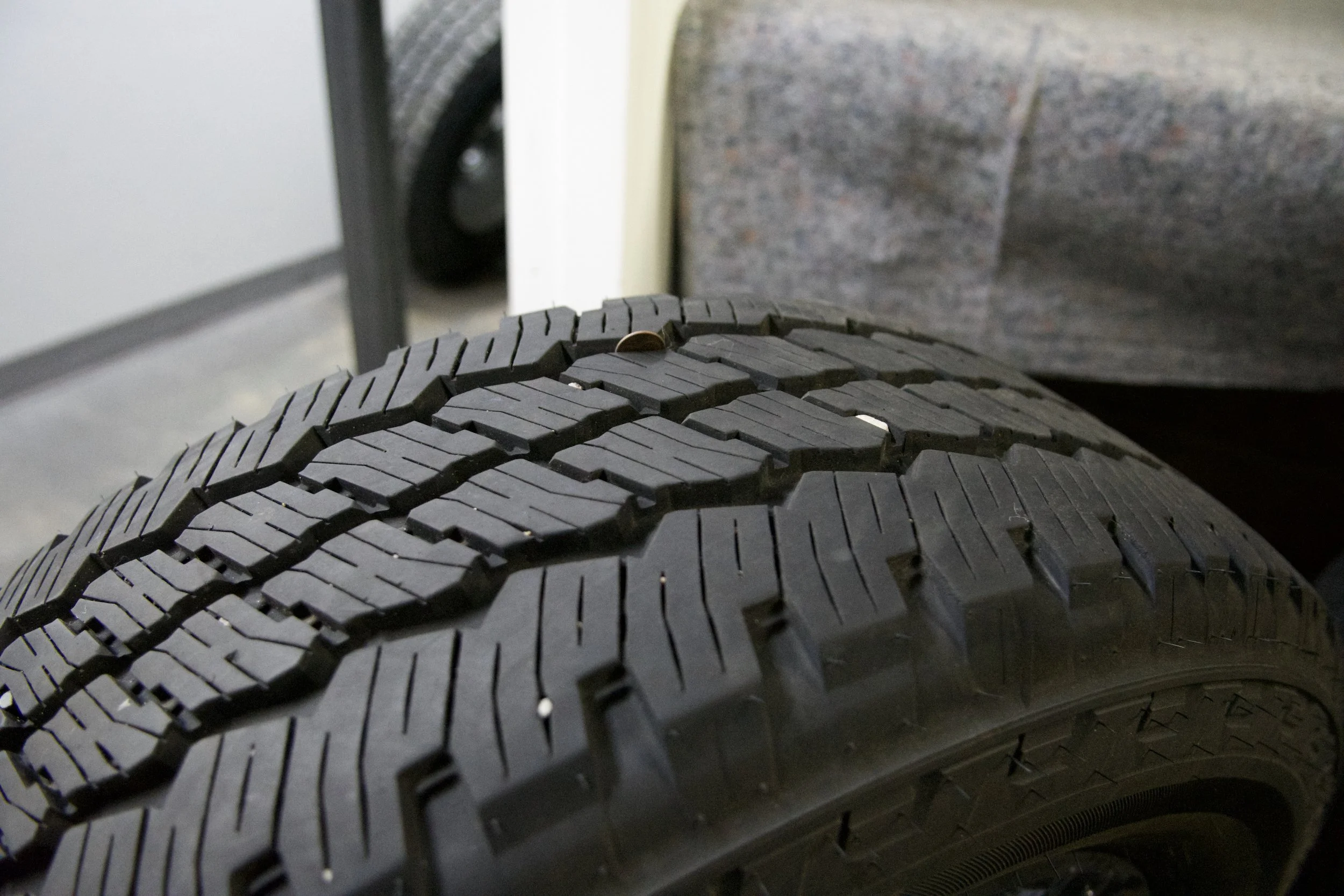 Bridgestone Dueler A/T LT275/65R20 all-terrain truck tire with 126/123R load rating and M+S rating, ideal for off-road and all-season driving.