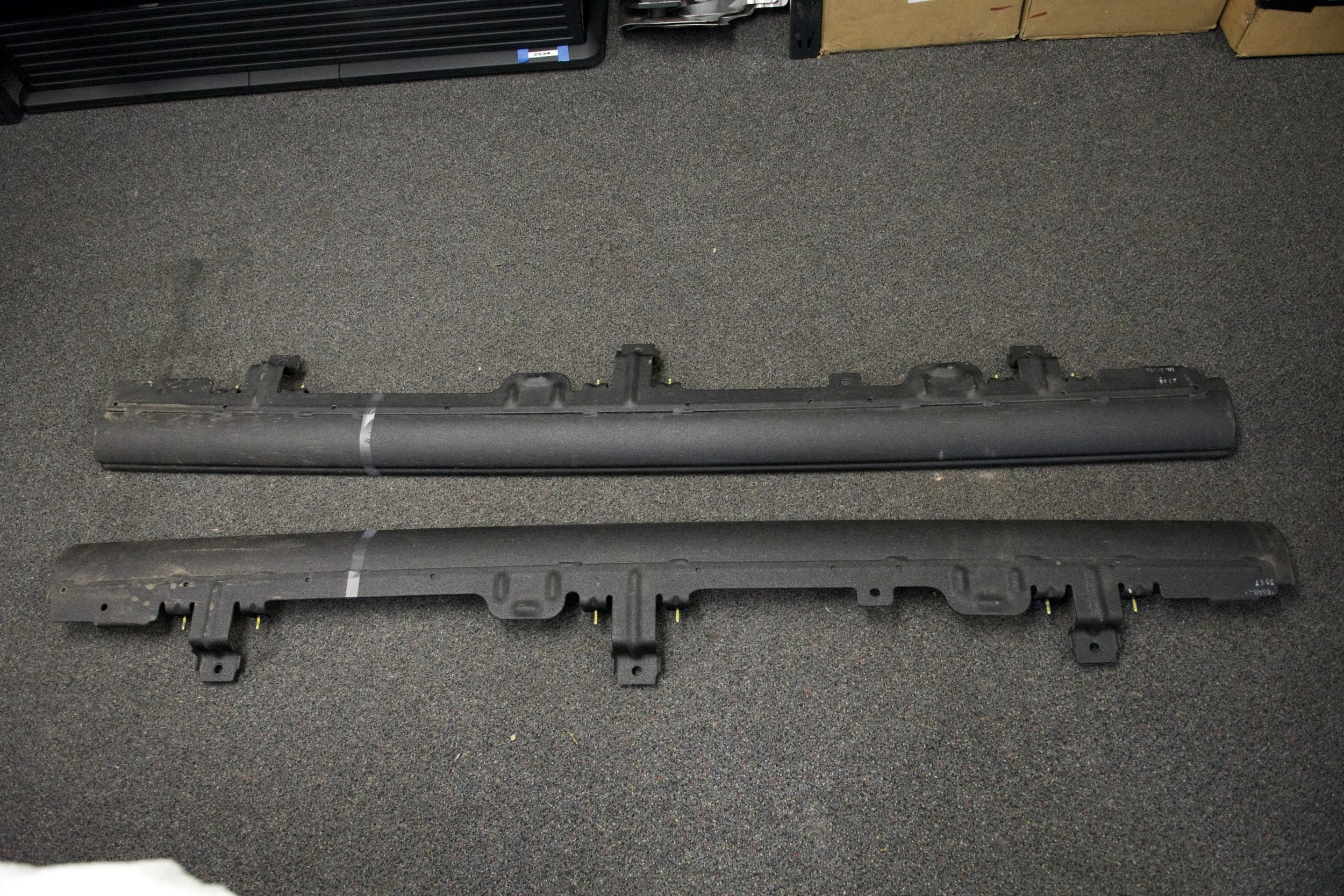 Close-up of the powder-coated texture on 6G factory rock sliders.