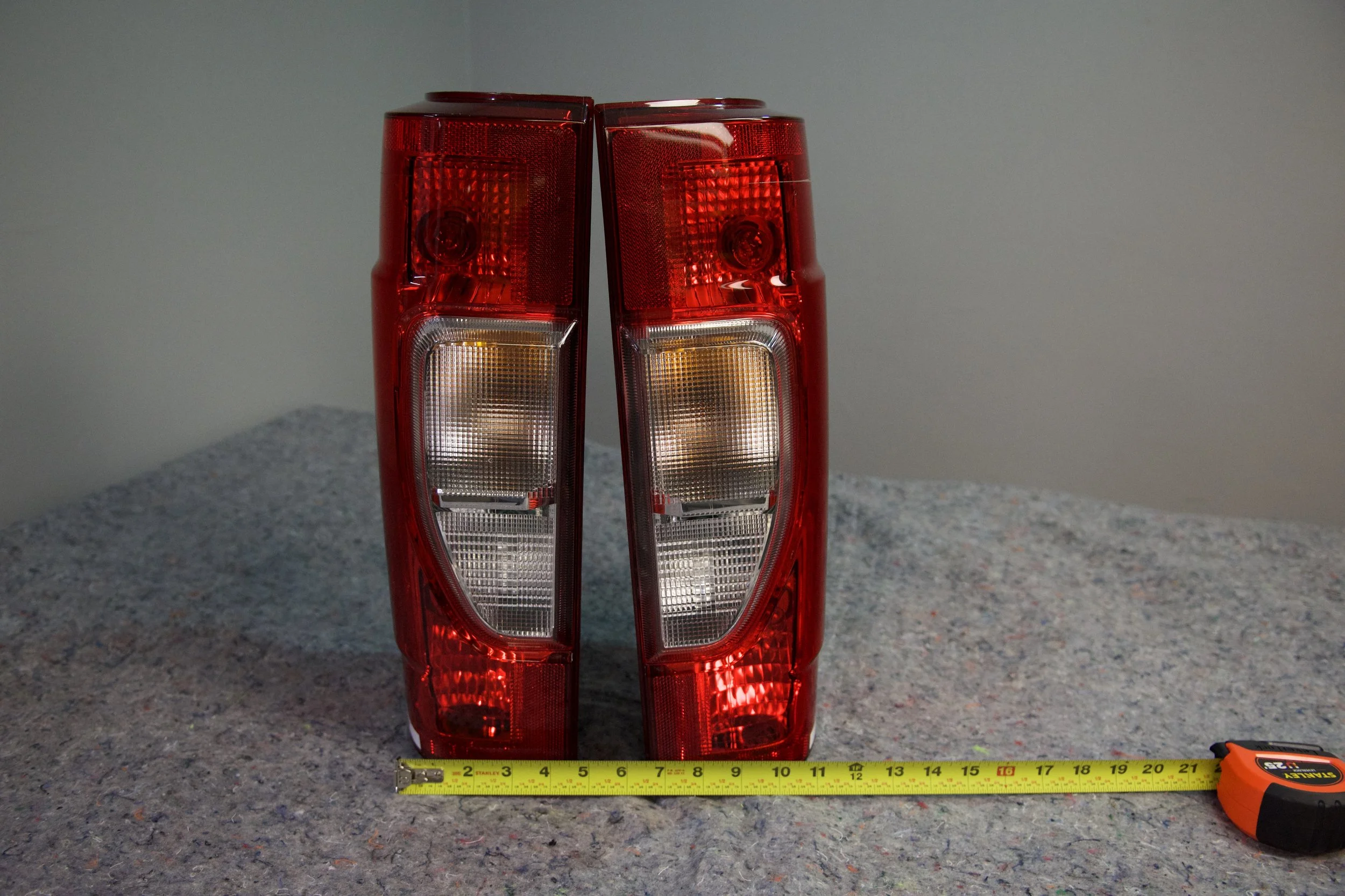 Standard INC tail light assembly for Ford truck – OEM-style replacement, durable housing, and easy installation.