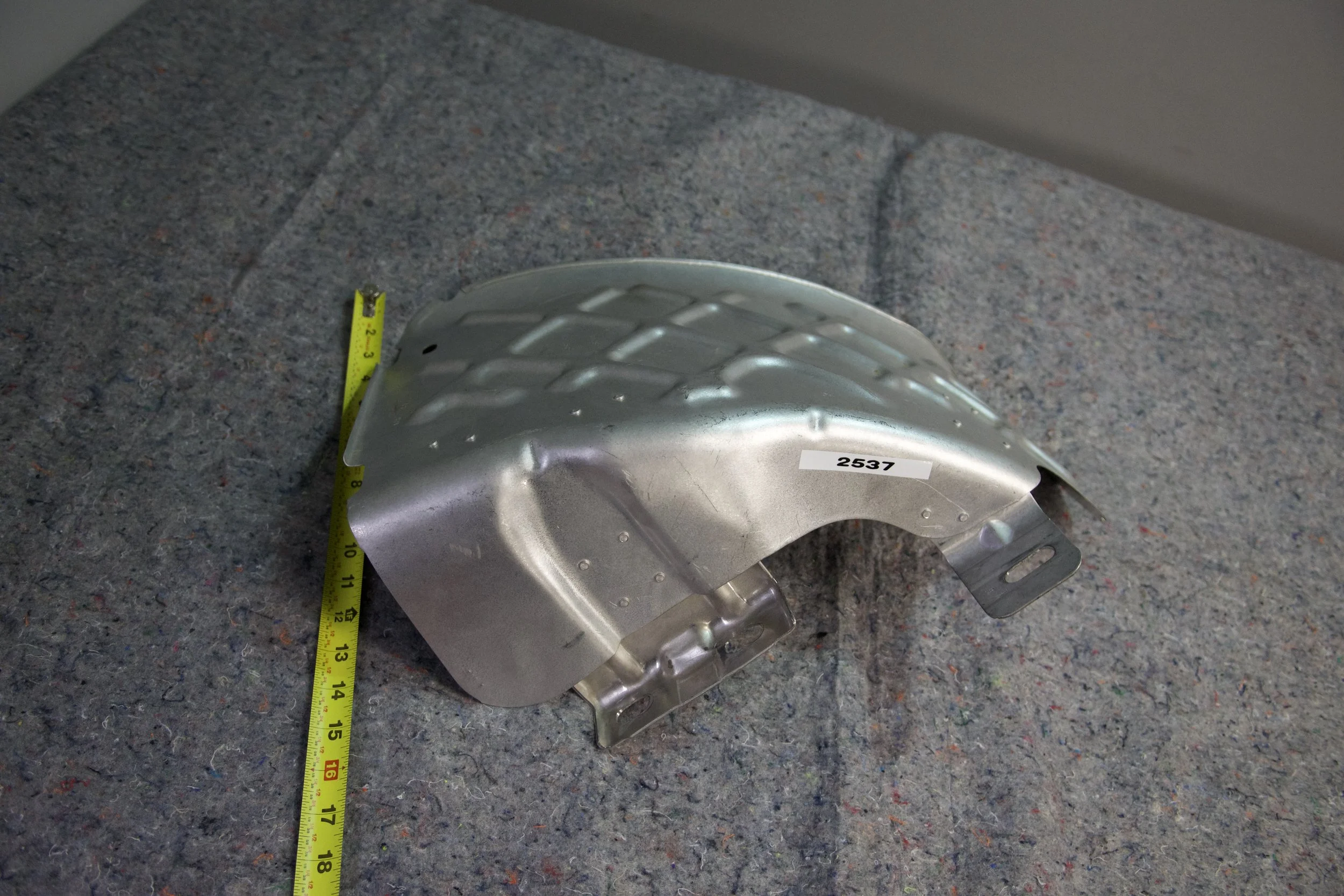 OEM-style spare tire heat shield for 2017–2025 Ford Super Duty F-250 and F-350, protects tire from exhaust heat.