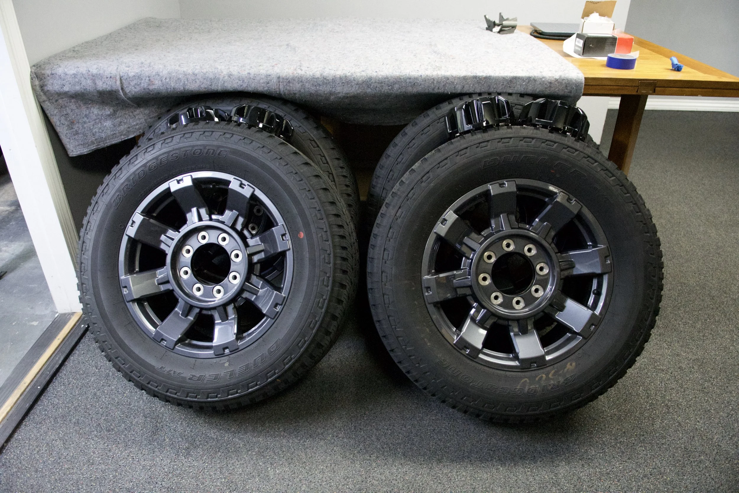 Bridgestone Dueler A/T LT275/65R20 all-terrain truck tire with 126/123R load rating and M+S rating, ideal for off-road and all-season driving.