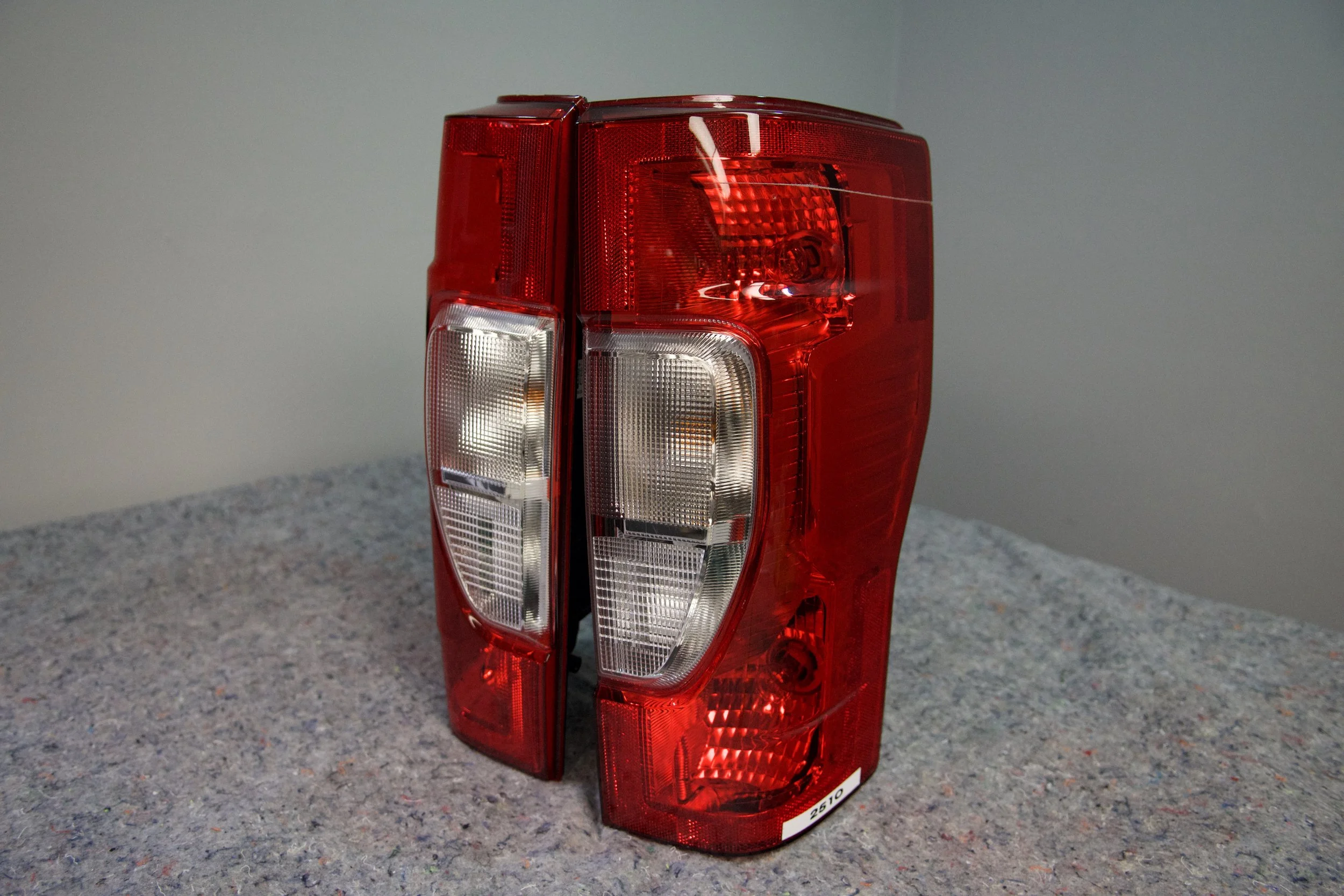 Standard INC tail light assembly for Ford truck – OEM-style replacement, durable housing, and easy installation.