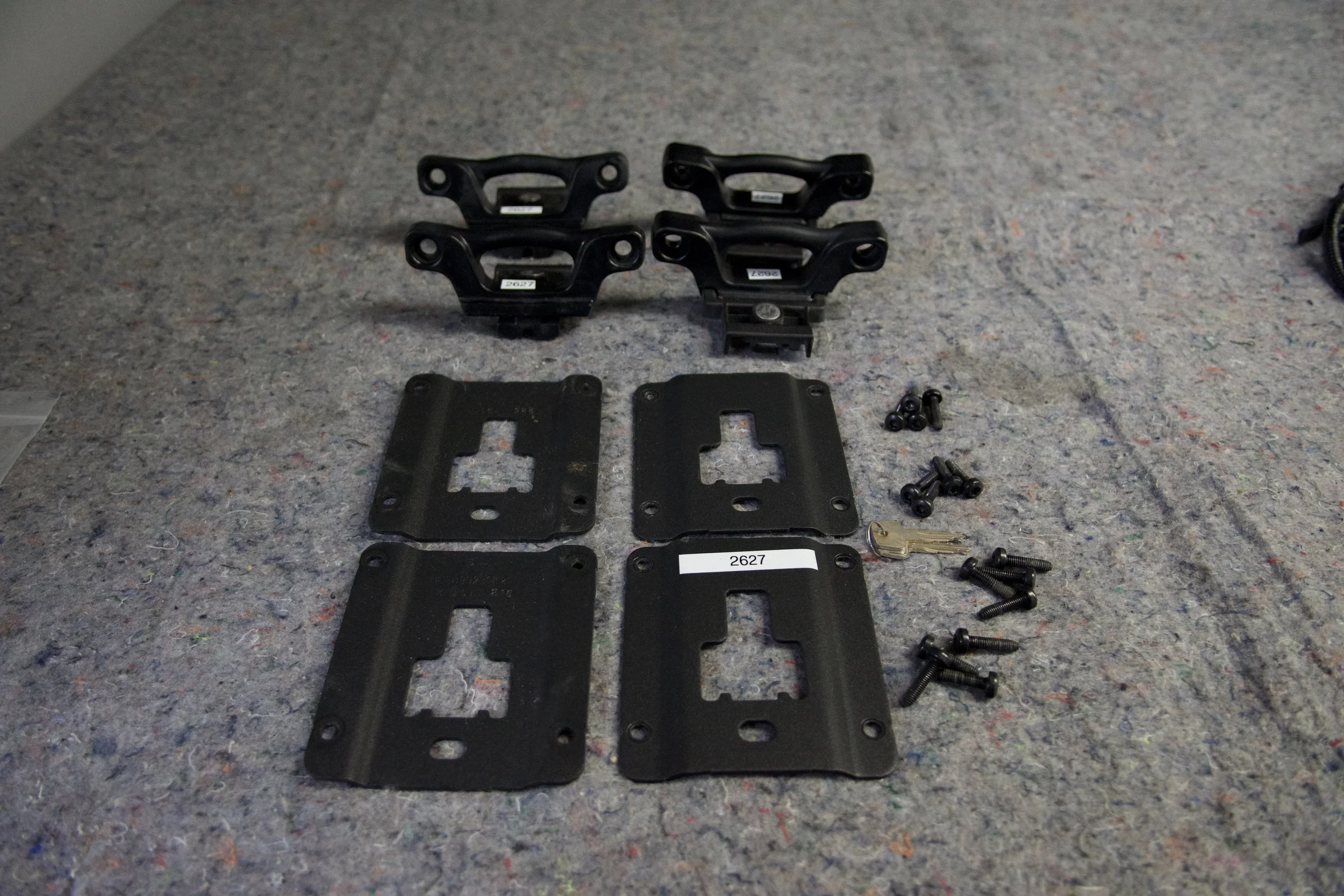 Ford OEM bed tie-down bracket and hardware kit SB#2627