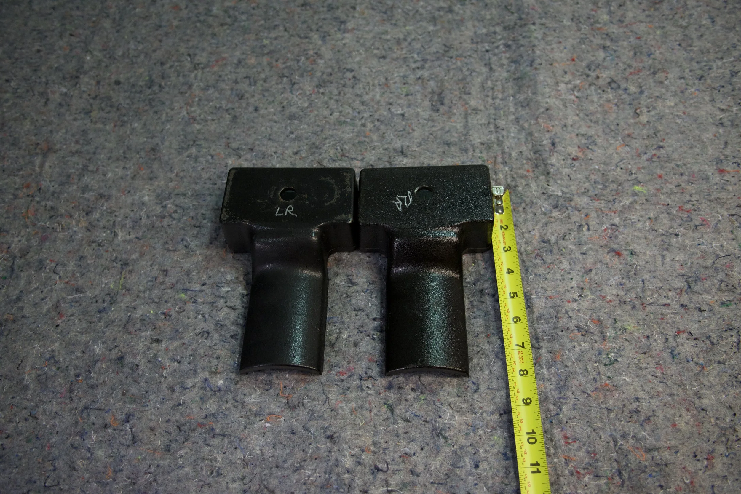 2024 Ford F350 OEM rear 2-inch lift blocks – factory take-off suspension components in excellent condition.