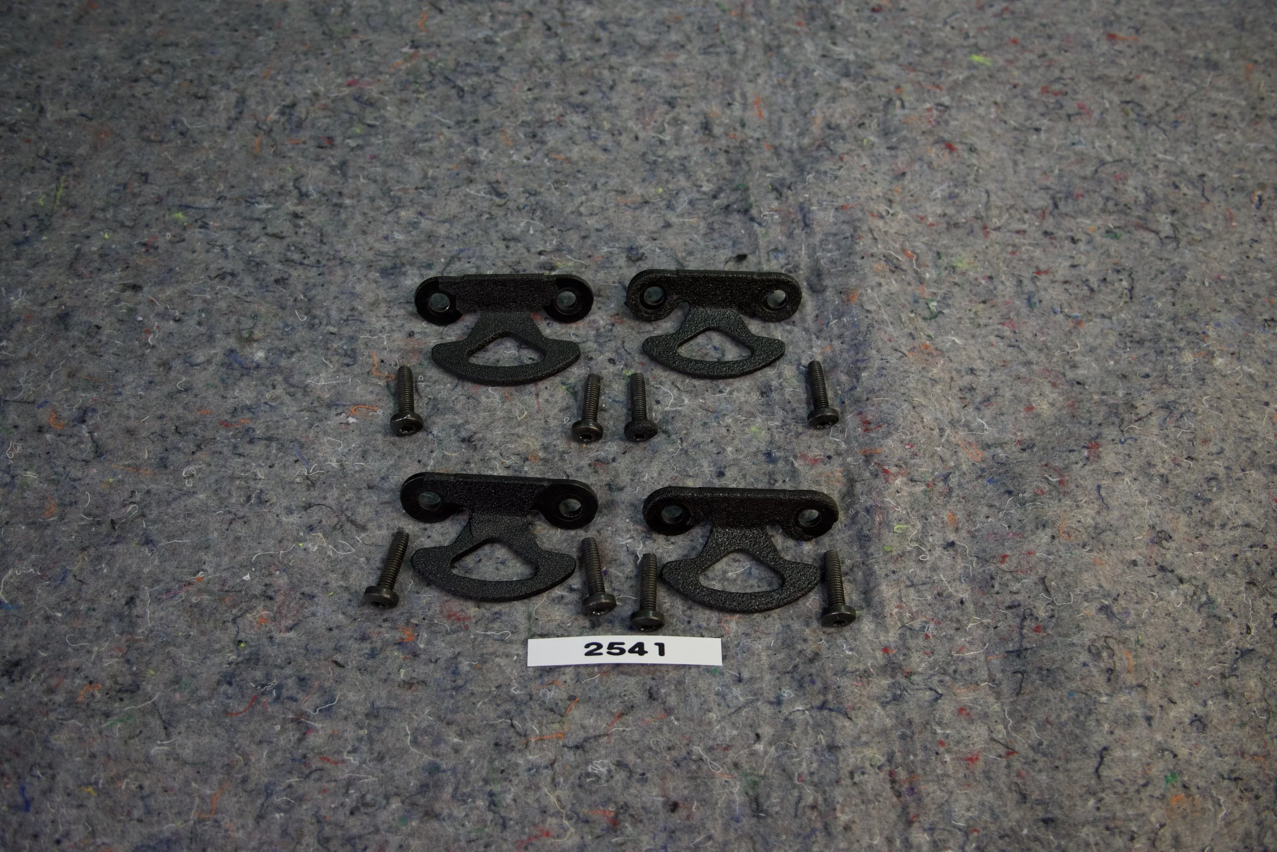 OEM 2017–2025 Ford Super Duty F-Series lower bed hooks with bed liner trim