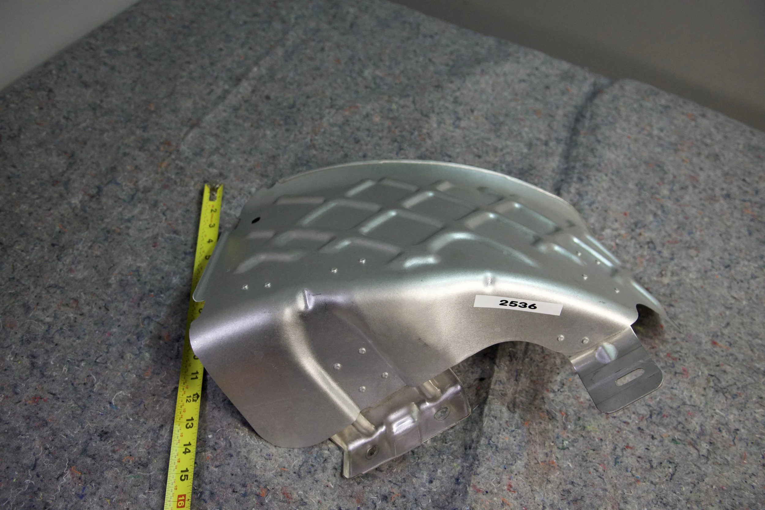OEM-style spare tire heat shield for 2017–2025 Ford Super Duty F-250 and F-350, protects tire from exhaust heat.