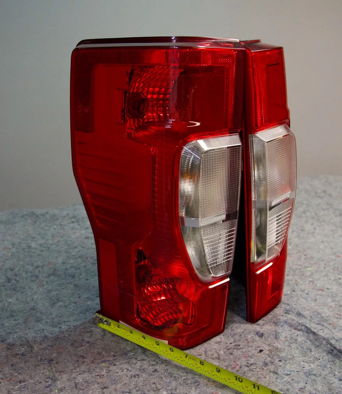 Standard INC tail light assembly for Ford truck – OEM-style replacement, durable housing, and easy installation.
