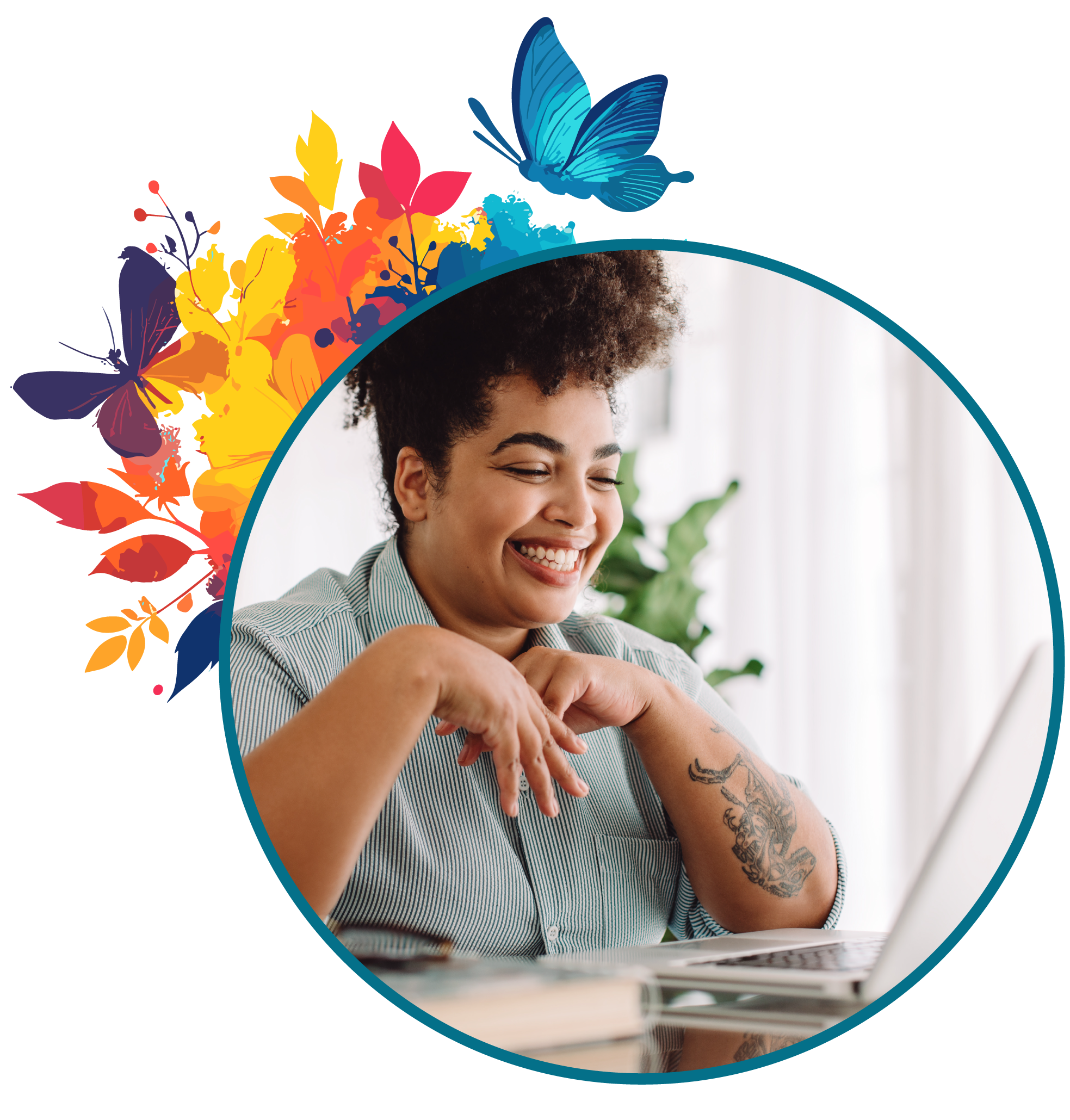 A smiling woman with curly hair sits at a desk in front of a laptop inside a bright room with sheer curtains and a green plant in the background.
