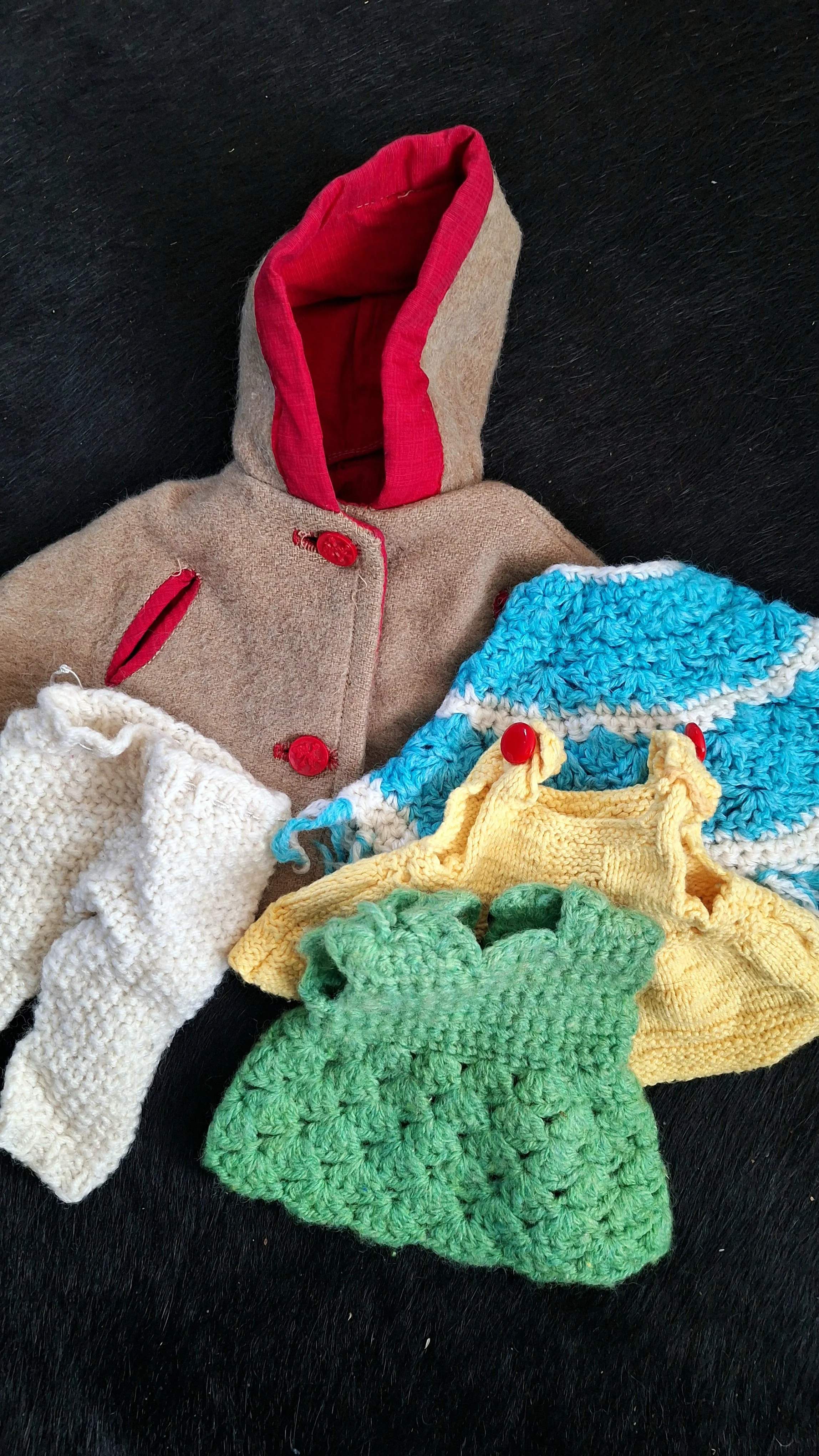 Crocheted doll clothes made by my mother, symbolizing creativity, handwork and the love for crochet passed on from mother to daughter.