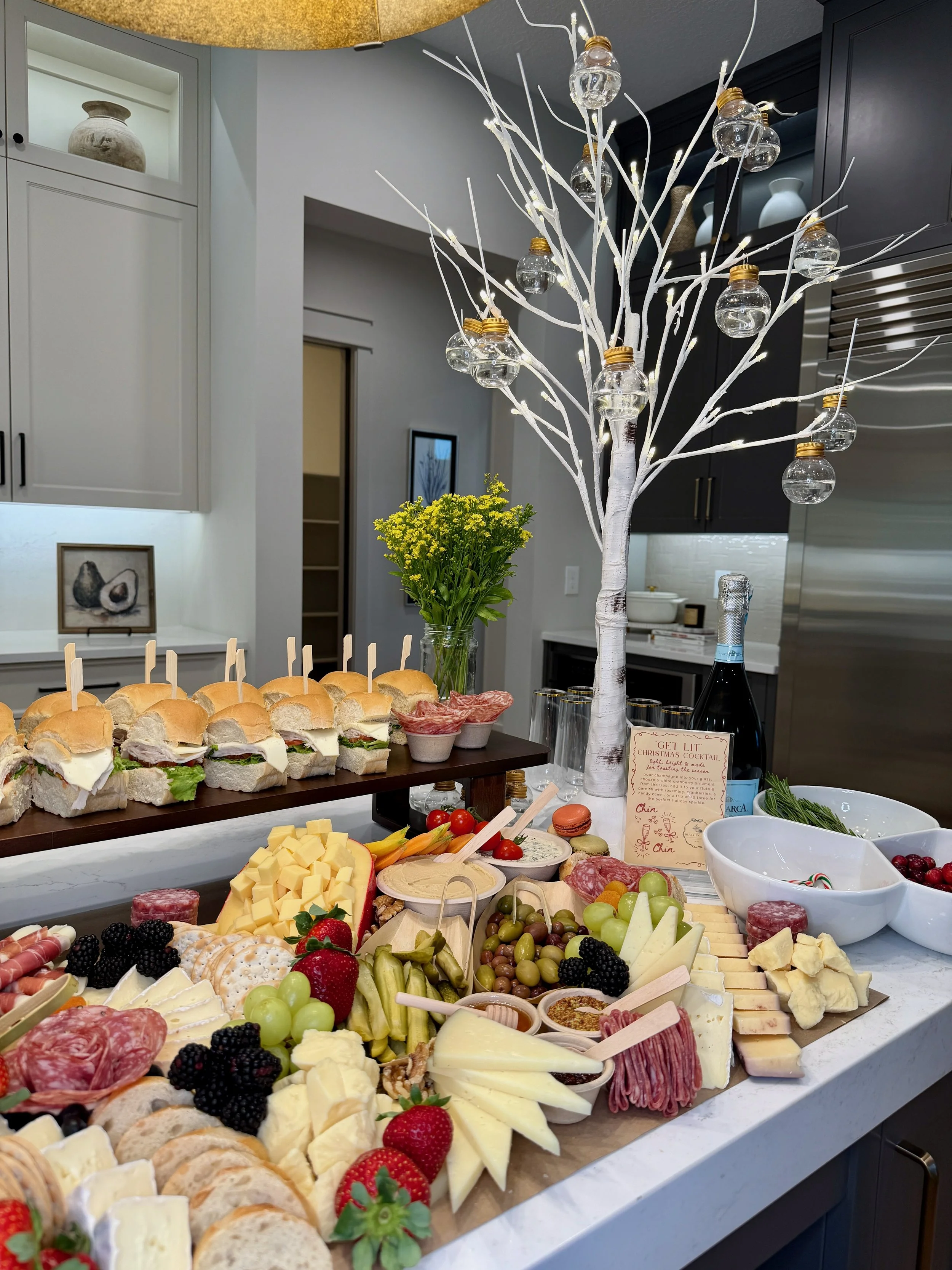 Grazing table featuring handcrafted charcuterie and fresh greenery in Ponte Vedra, Florida.