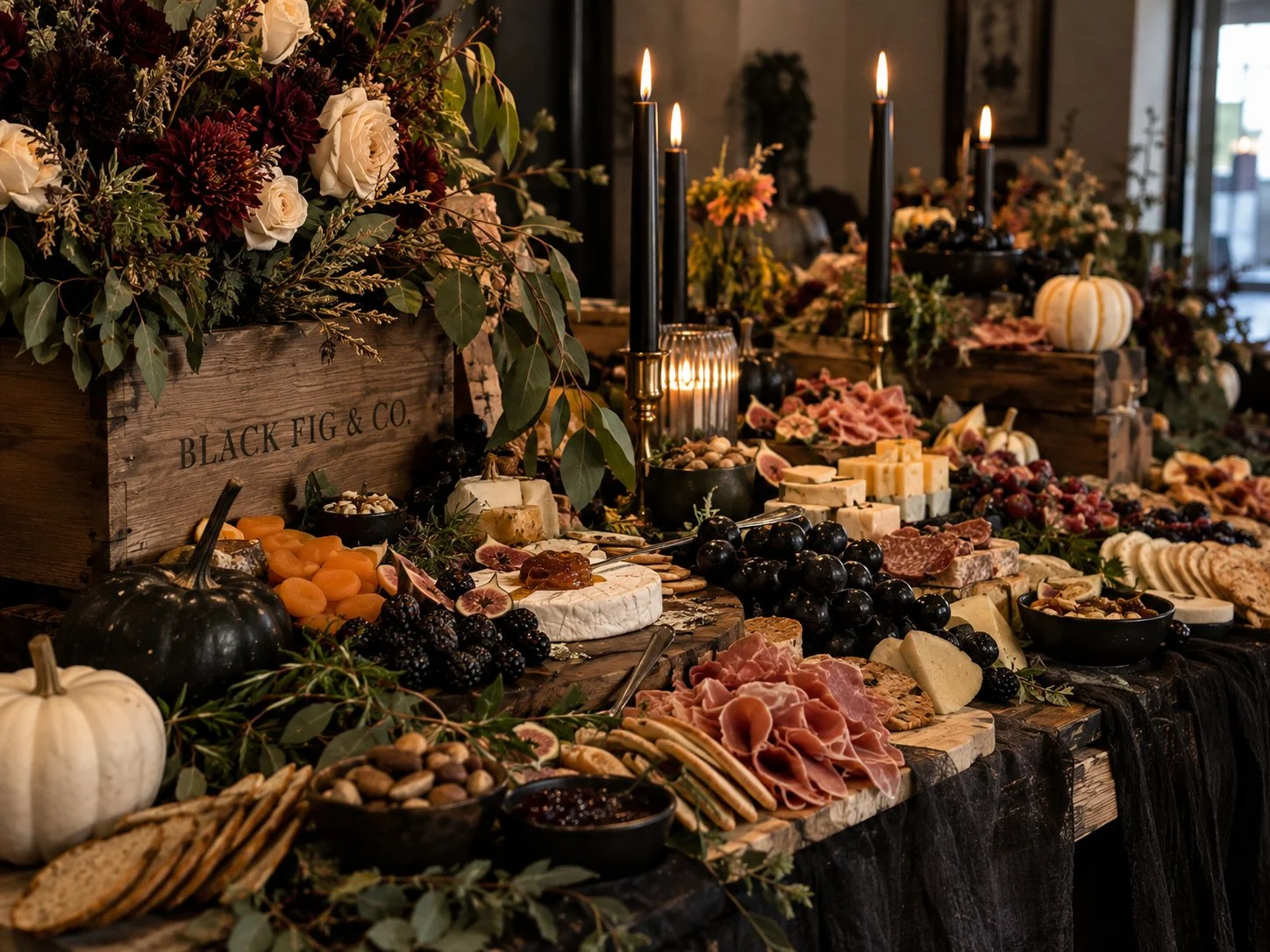 Black Fig & Co. Halloween grazing table with artisan cheeses, charcuterie, seasonal fruit & autumn-inspired styling