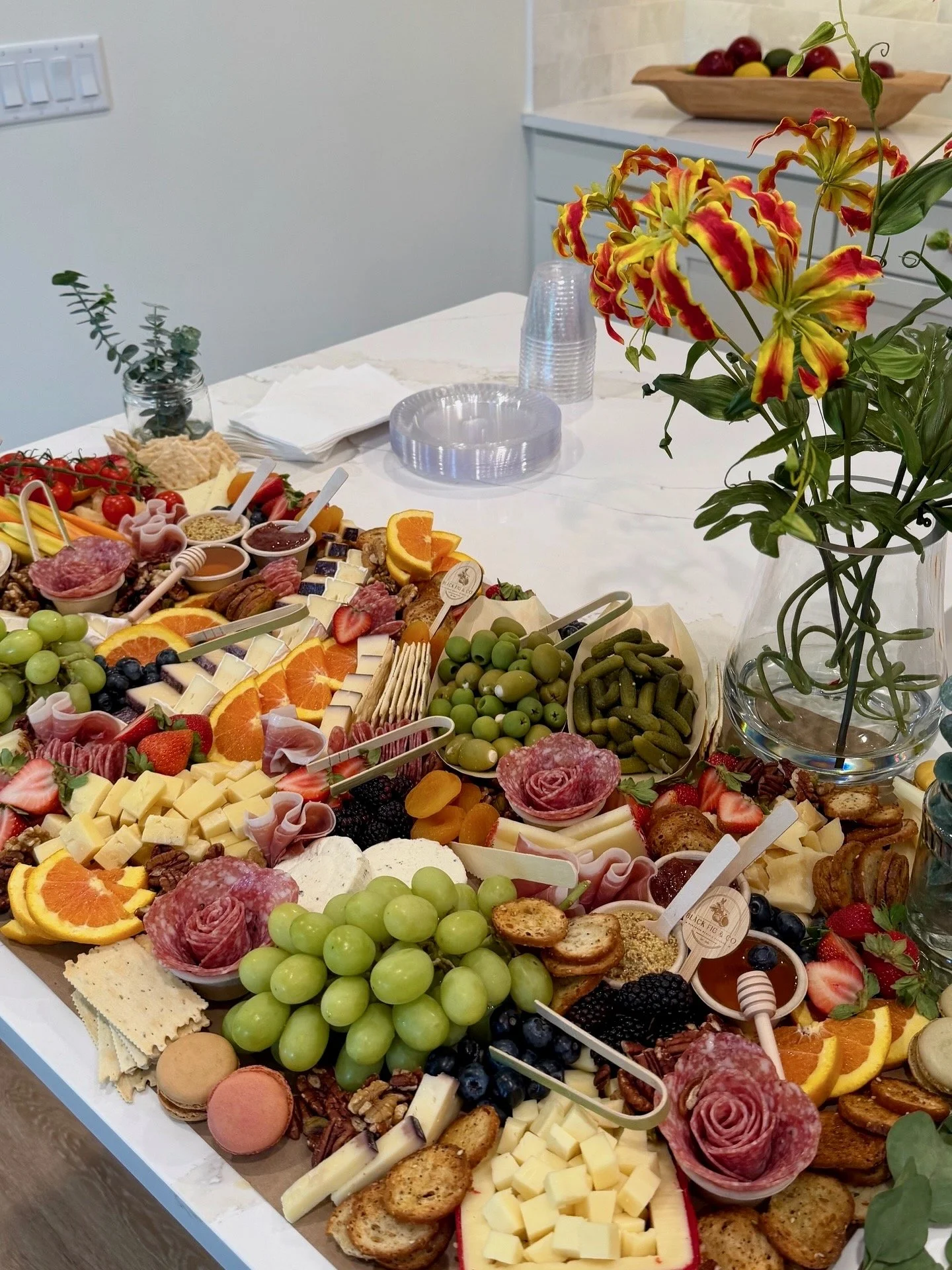 Charcuterie table with premium cheeses and fresh accompaniments in Ponte Vedra Beach, Florida.