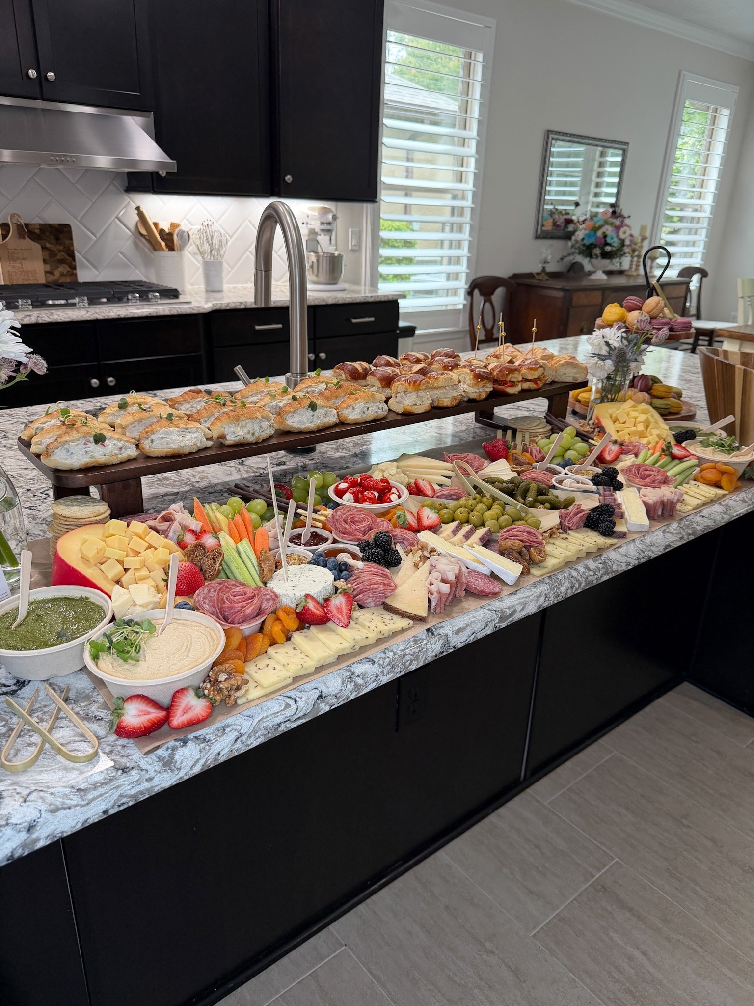 Custom charcuterie table arranged with seasonal ingredients in Jacksonville, Florida.