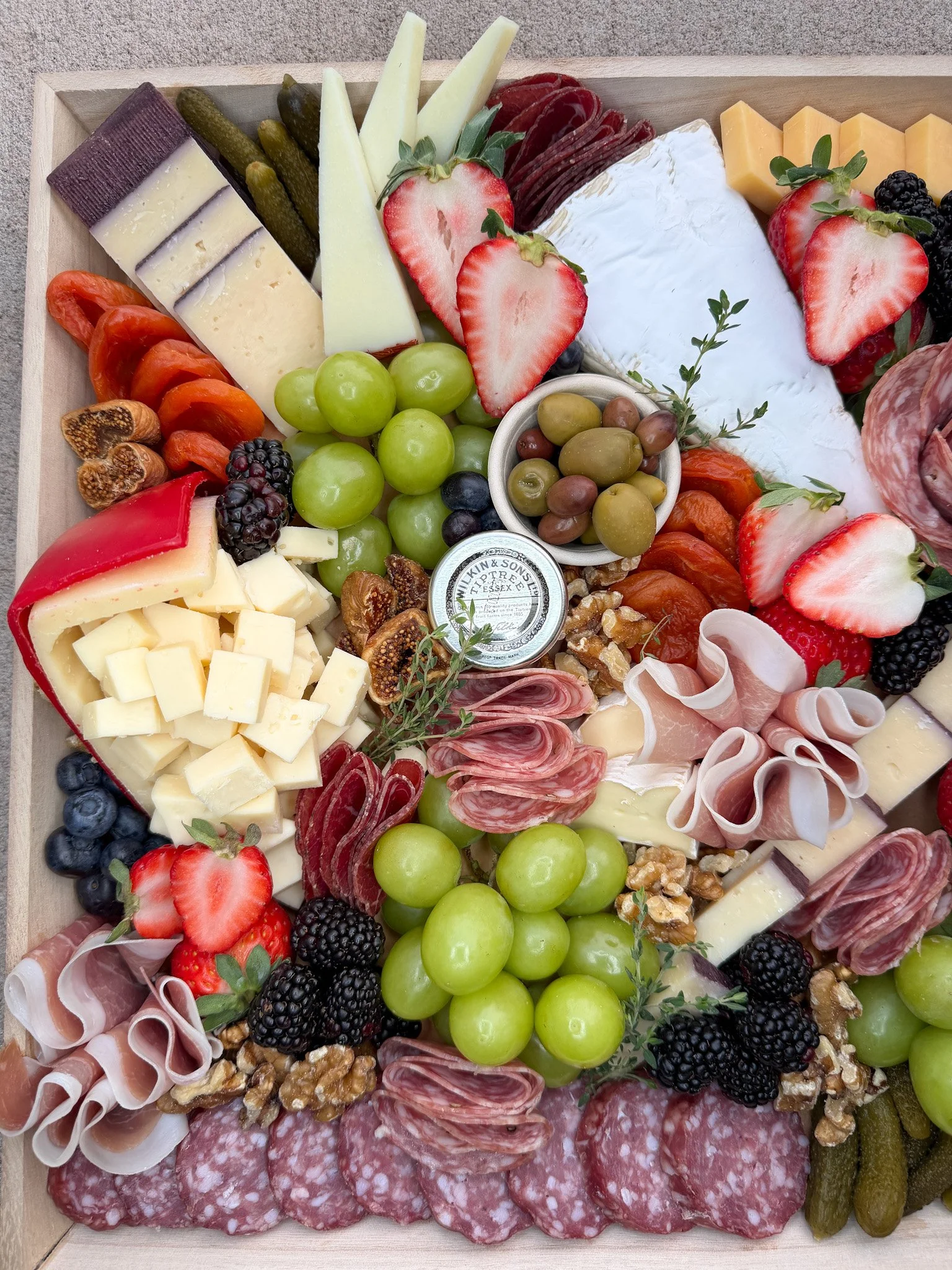 Ciao Bella large catering charcuterie board for 10 guests with artisan cheeses, cured meats, fruit and crackers, available for local pickup or delivery in St. Johns County, Nocatee, Ponte Vedra, Ponte Vedra Beach, St. Augustine and Jacksonville