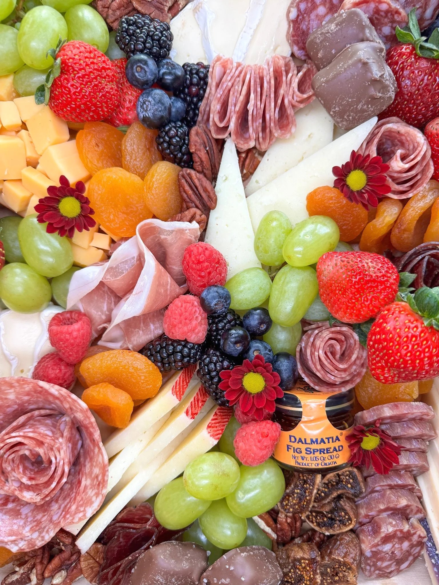 Piccolo Fioré large charcuterie catering board for 10 guests with artisan cheeses, cured meats, fresh fruit and gourmet accompaniments, available for local pickup or delivery in St. Johns County, Nocatee, Ponte Vedra, Ponte Vedra Beach, St. Augustine