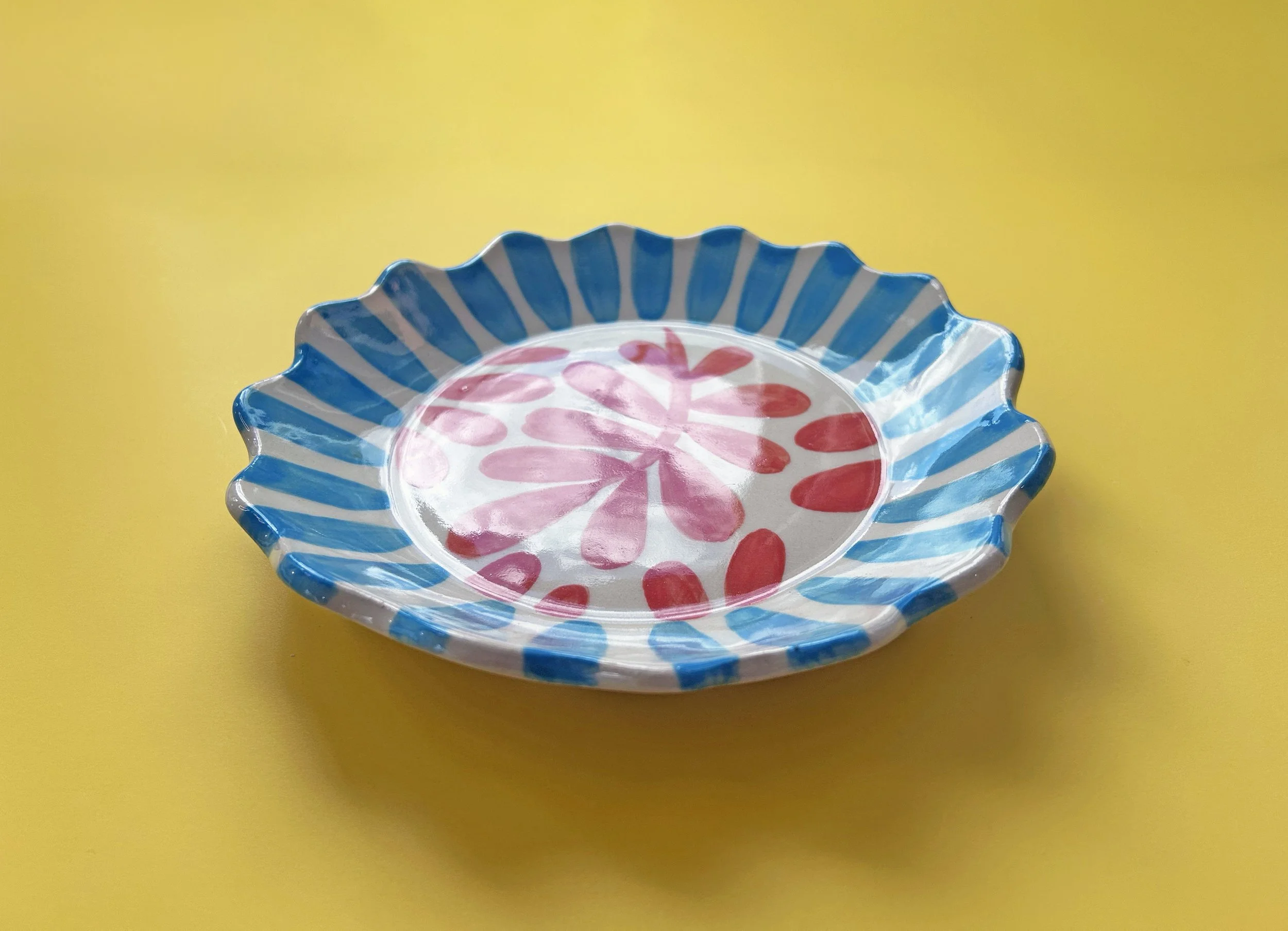 10.6 blue red floral ceramic dish.jpg