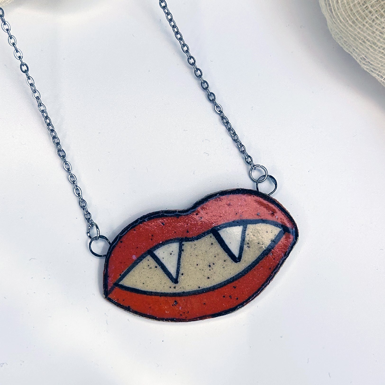 red lip vampire pendant necklace.jpg