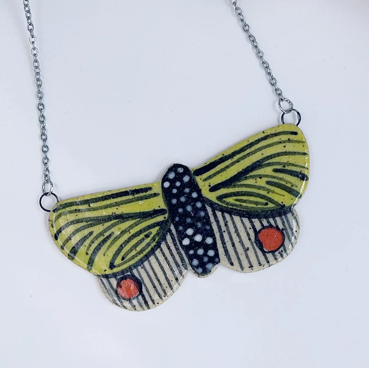 lime moth pendant necklace.jpg