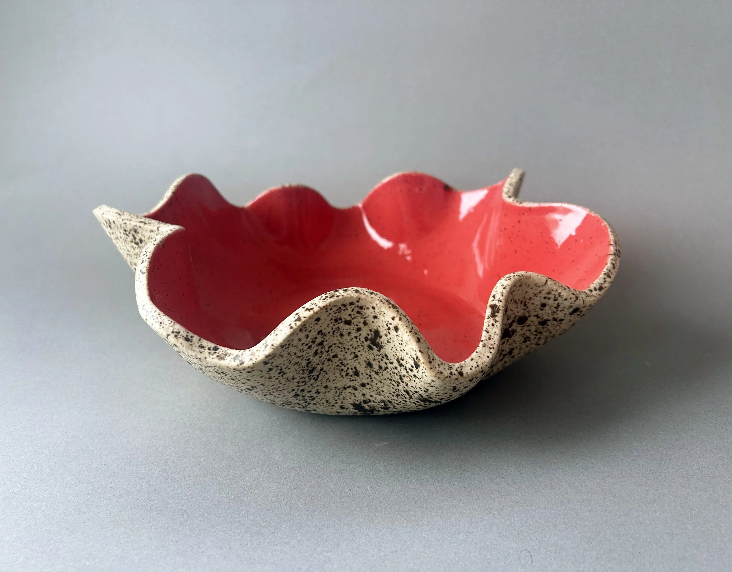 Speckled brown and pink stoneware bowl.jpg