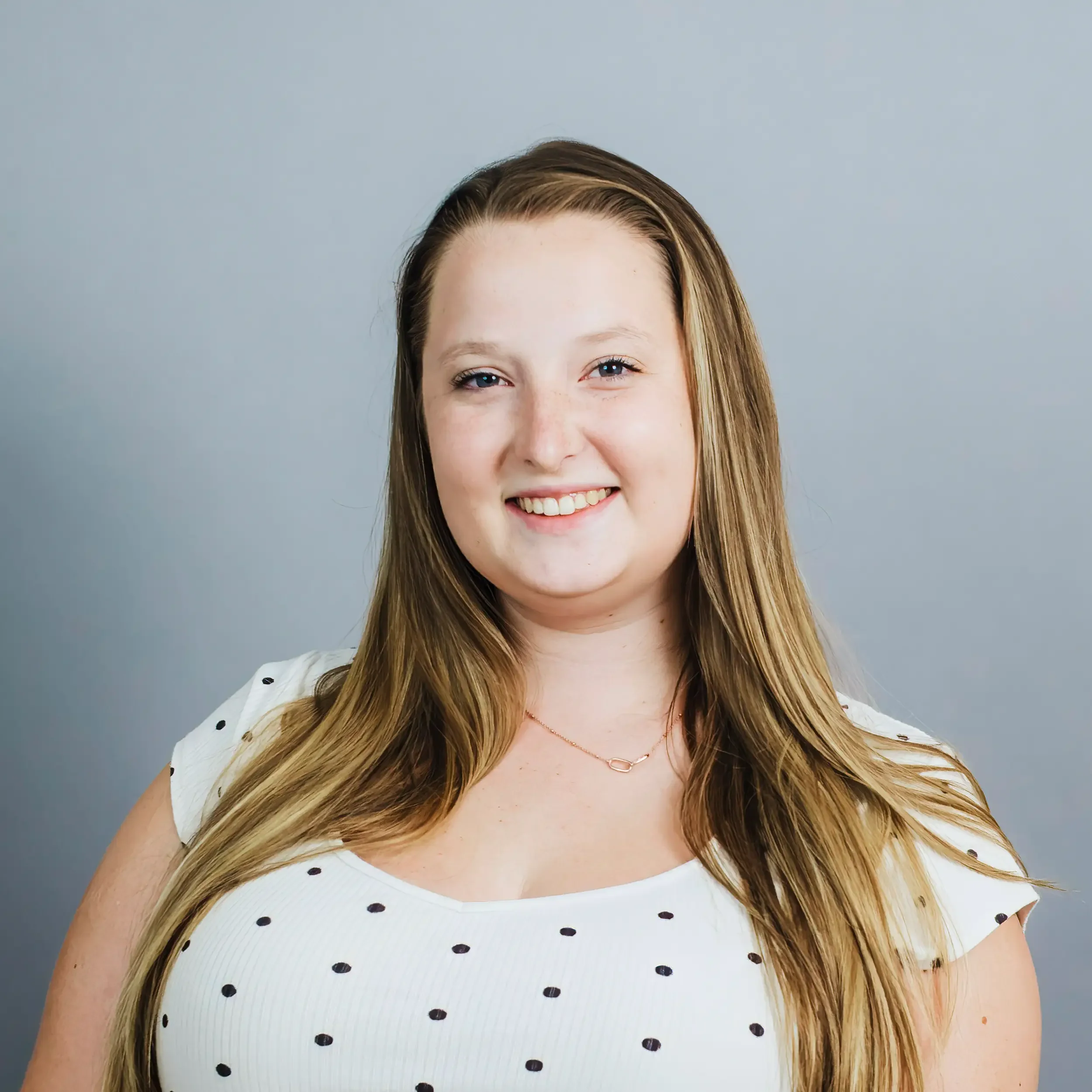 A headshot of Madison Folley