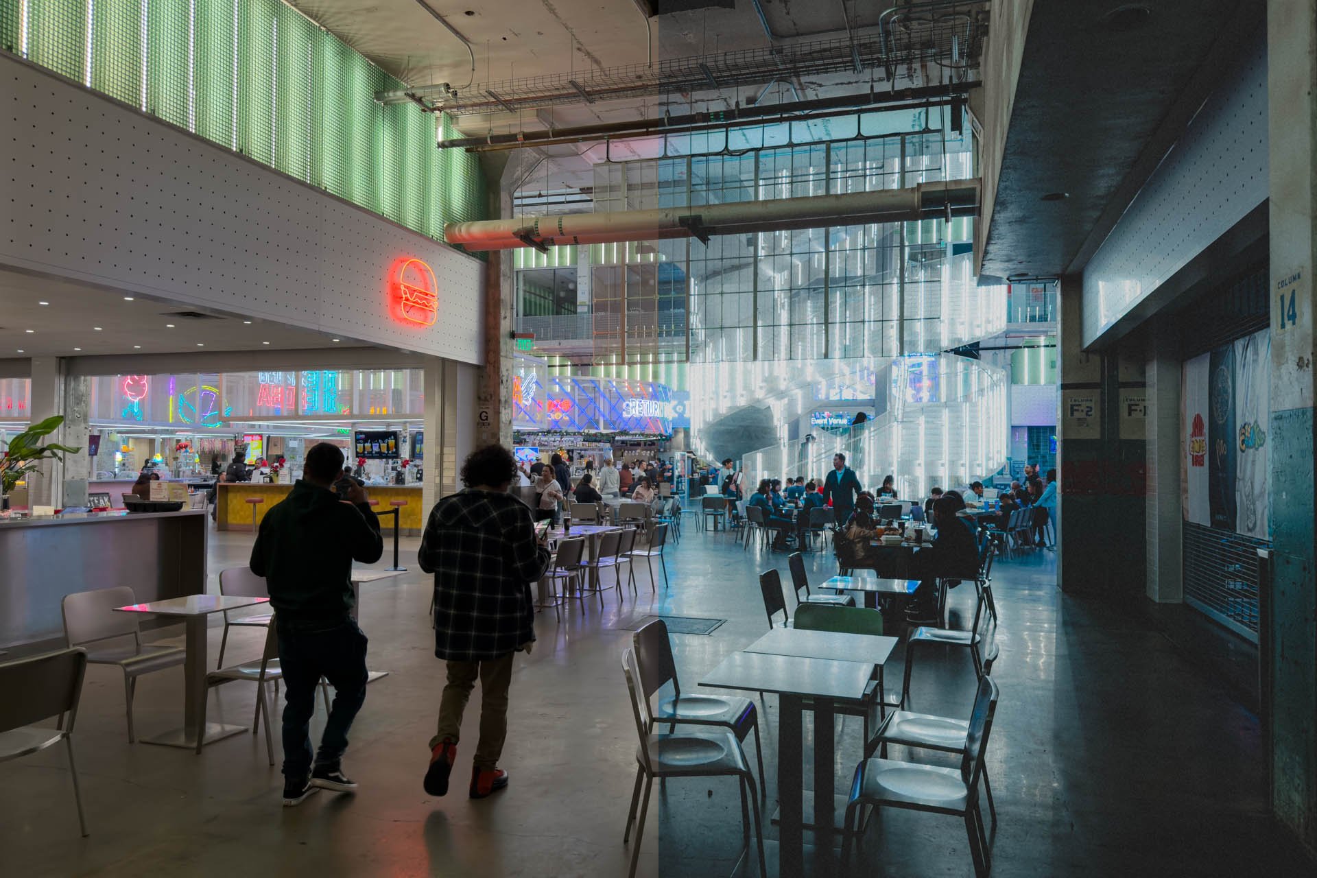 A modern indoor food court with people sitting at tables and walking around, featuring neon signs and a bright, glass facade.